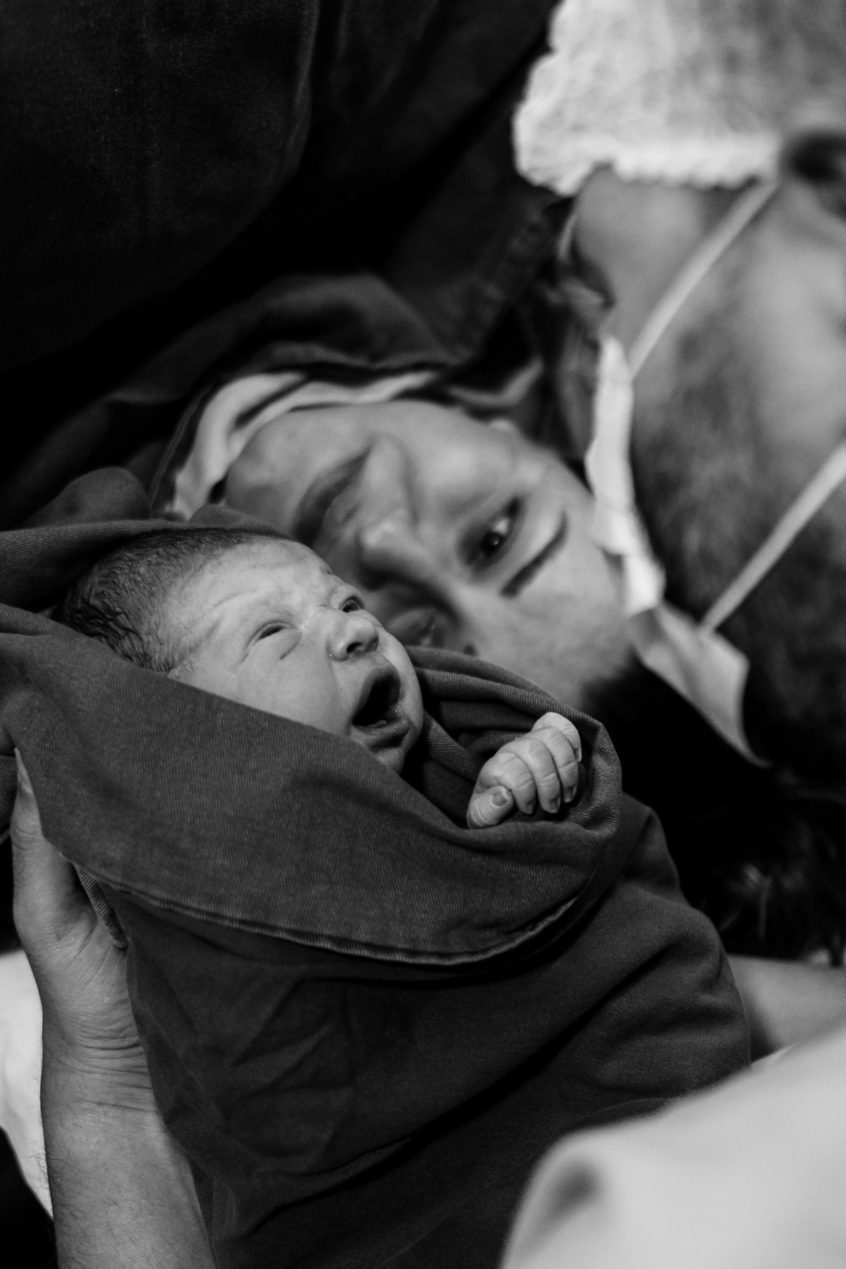 Fotos de parto e nascimento por Thiago Braga, sobre a chegada do Isaac em Florianópolis.