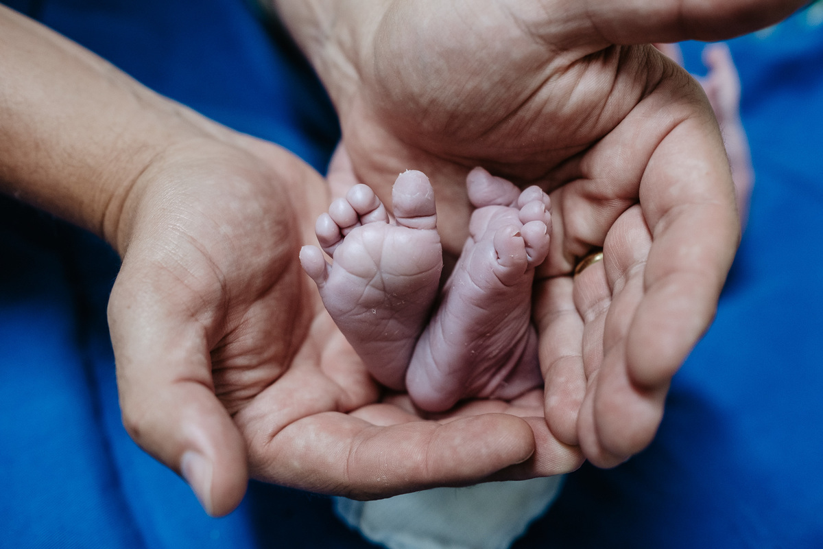 Fotos de parto e nascimento por Thiago Braga, sobre a chegada do Isaac em Florianópolis.