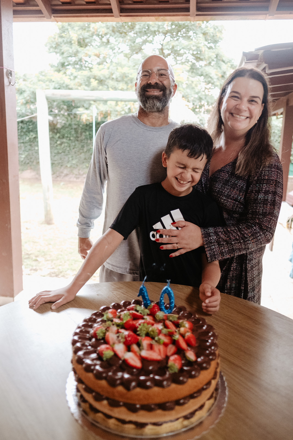 fotografia documental de aniversário, em casa, 10 anos do Antonio, campeche-sc por Thiago Braga