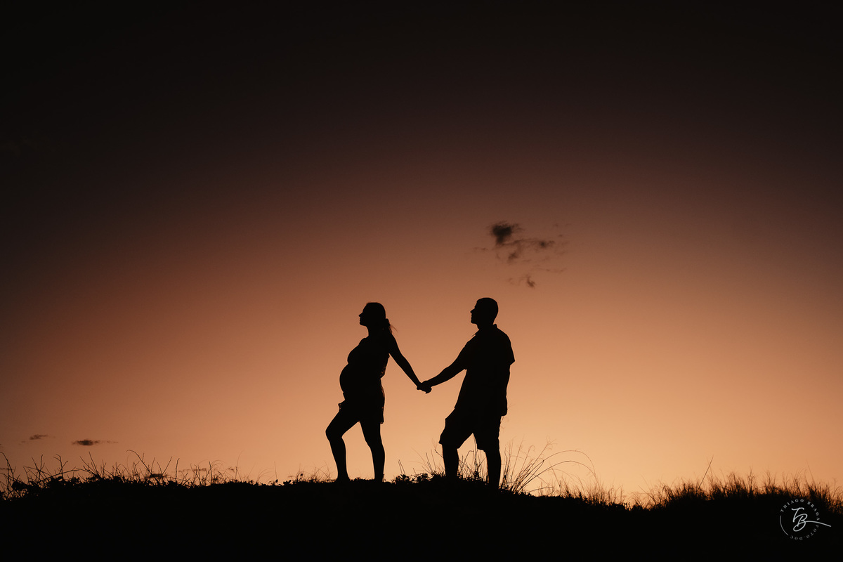 ensaio gestante no amanhecer na praia do campeche em Florianópolis, por Thiago Braga Fotografia