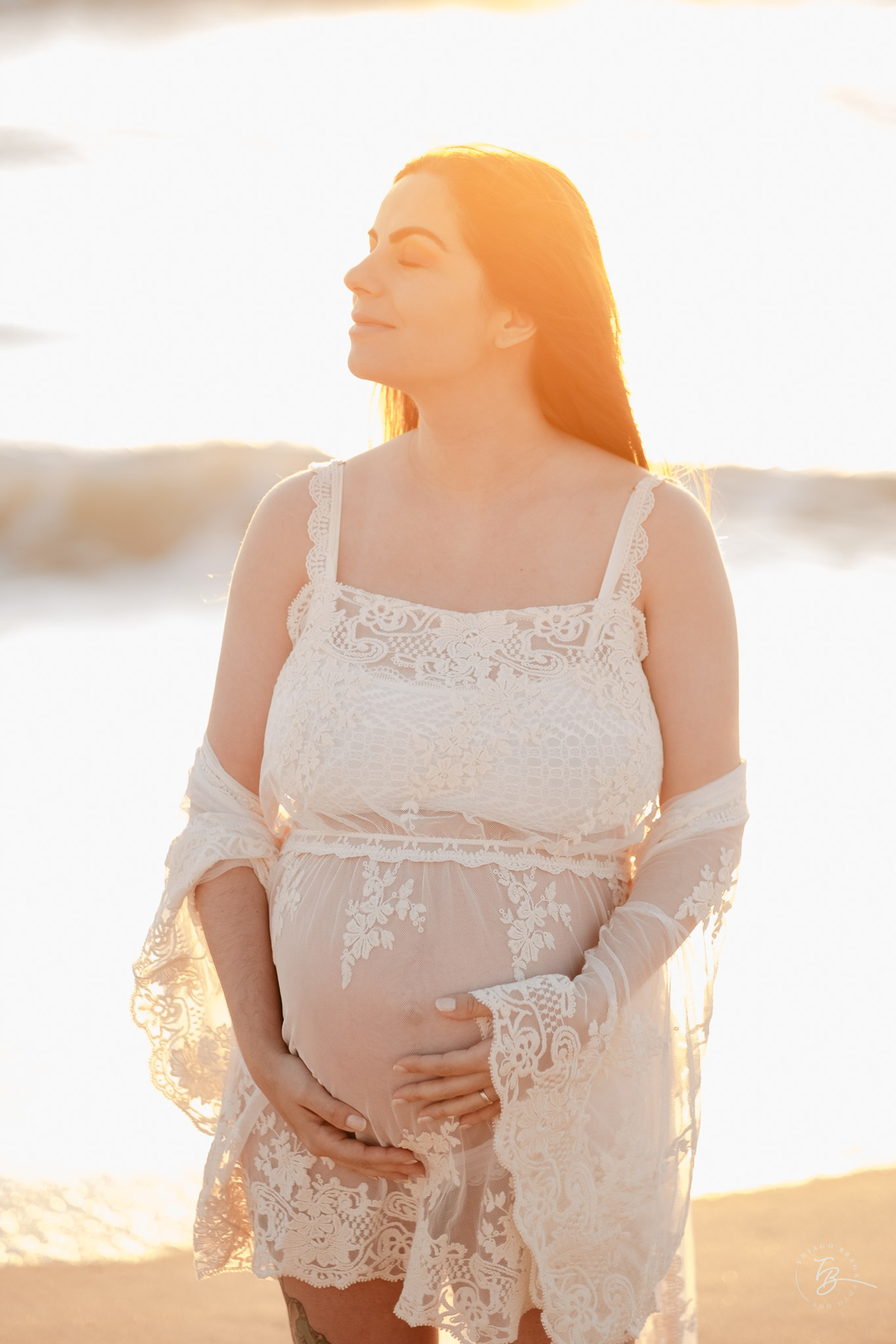 ensaio gestante no amanhecer na praia do campeche em Florianópolis, por Thiago Braga Fotografia