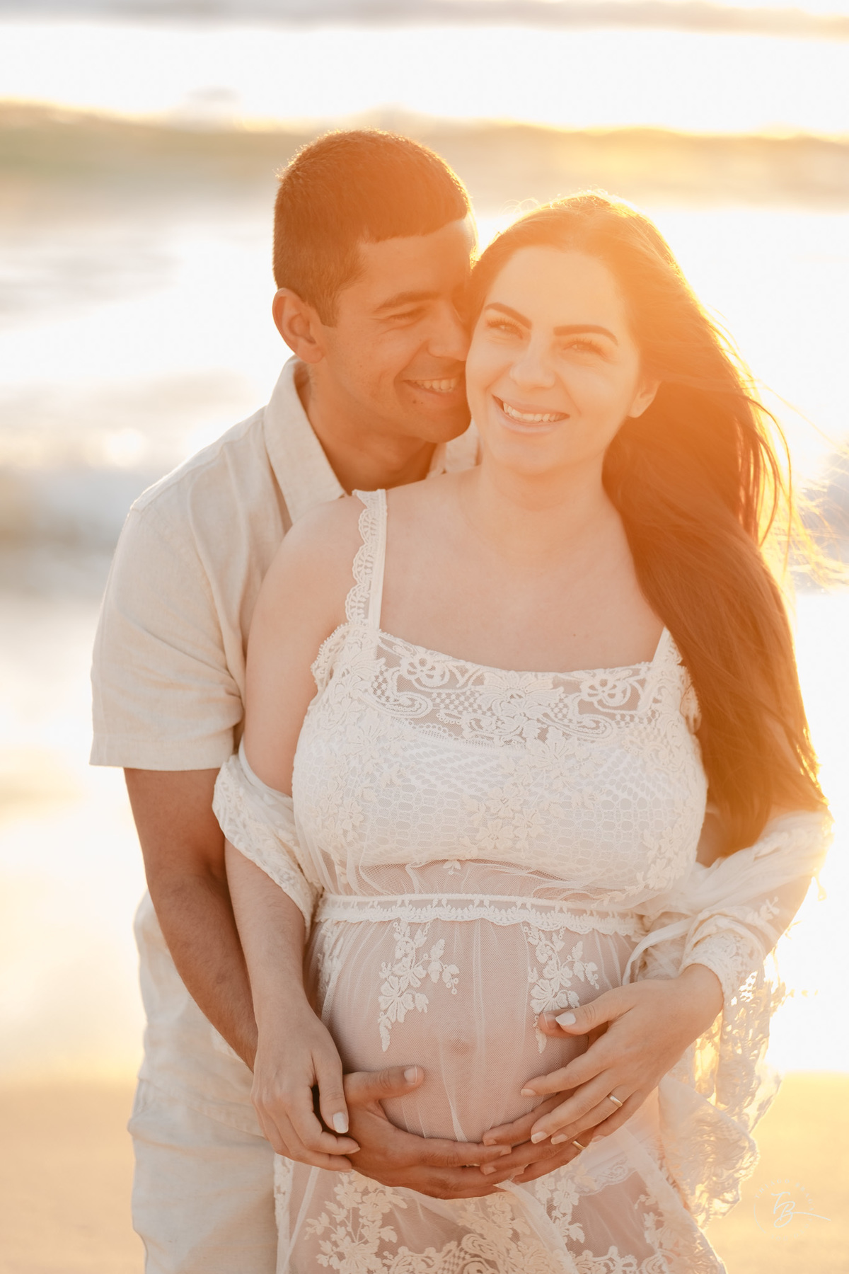 ensaio gestante no amanhecer na praia do campeche em Florianópolis, por Thiago Braga Fotografia