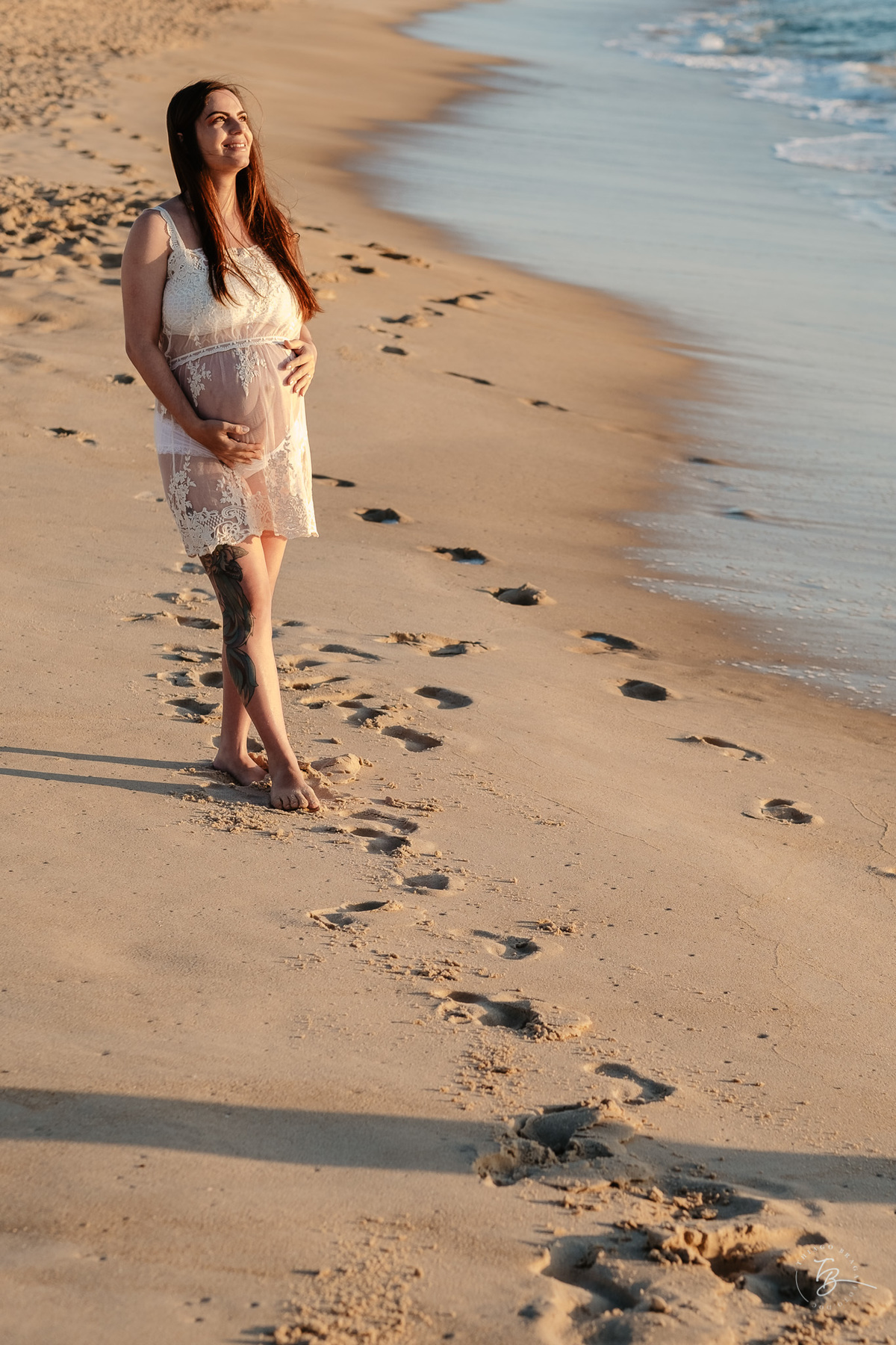 ensaio gestante no amanhecer na praia do campeche em Florianópolis, por Thiago Braga Fotografia