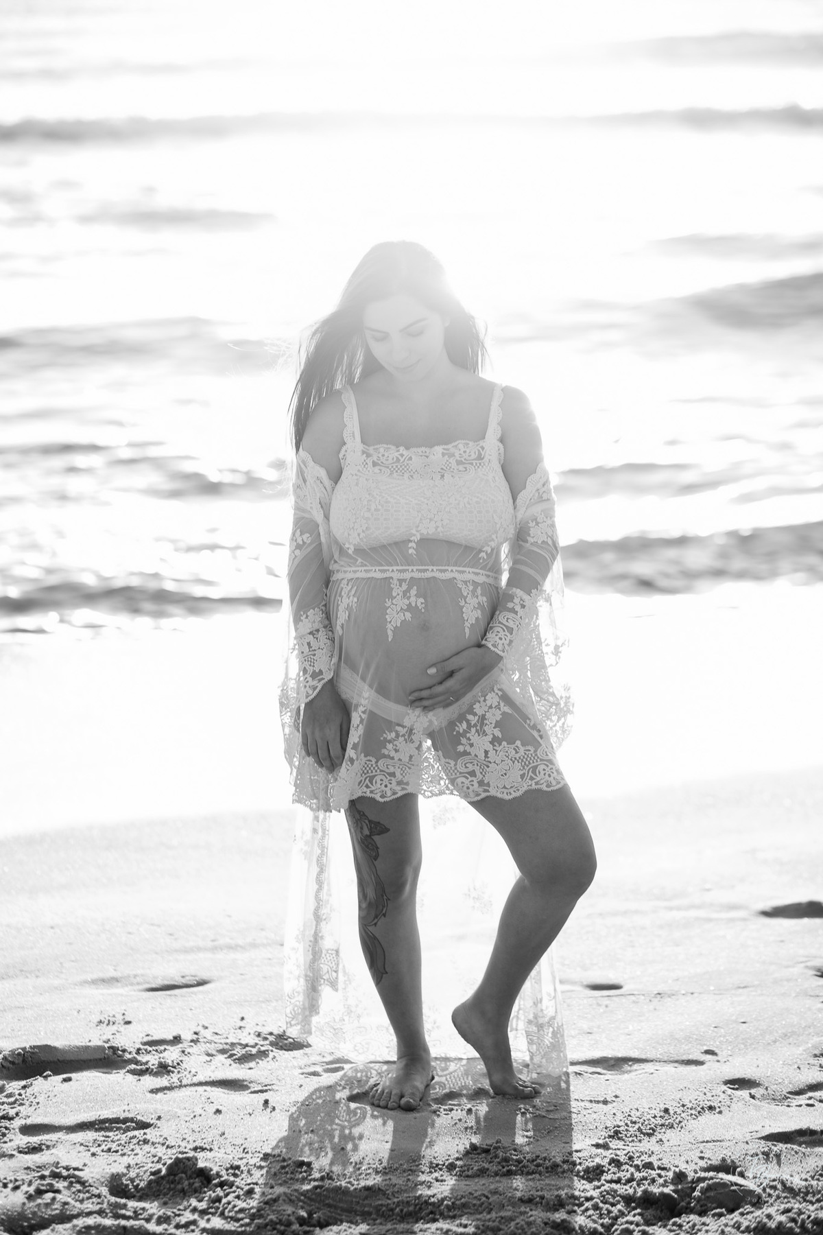 ensaio gestante no amanhecer na praia do campeche em Florianópolis, por Thiago Braga Fotografia