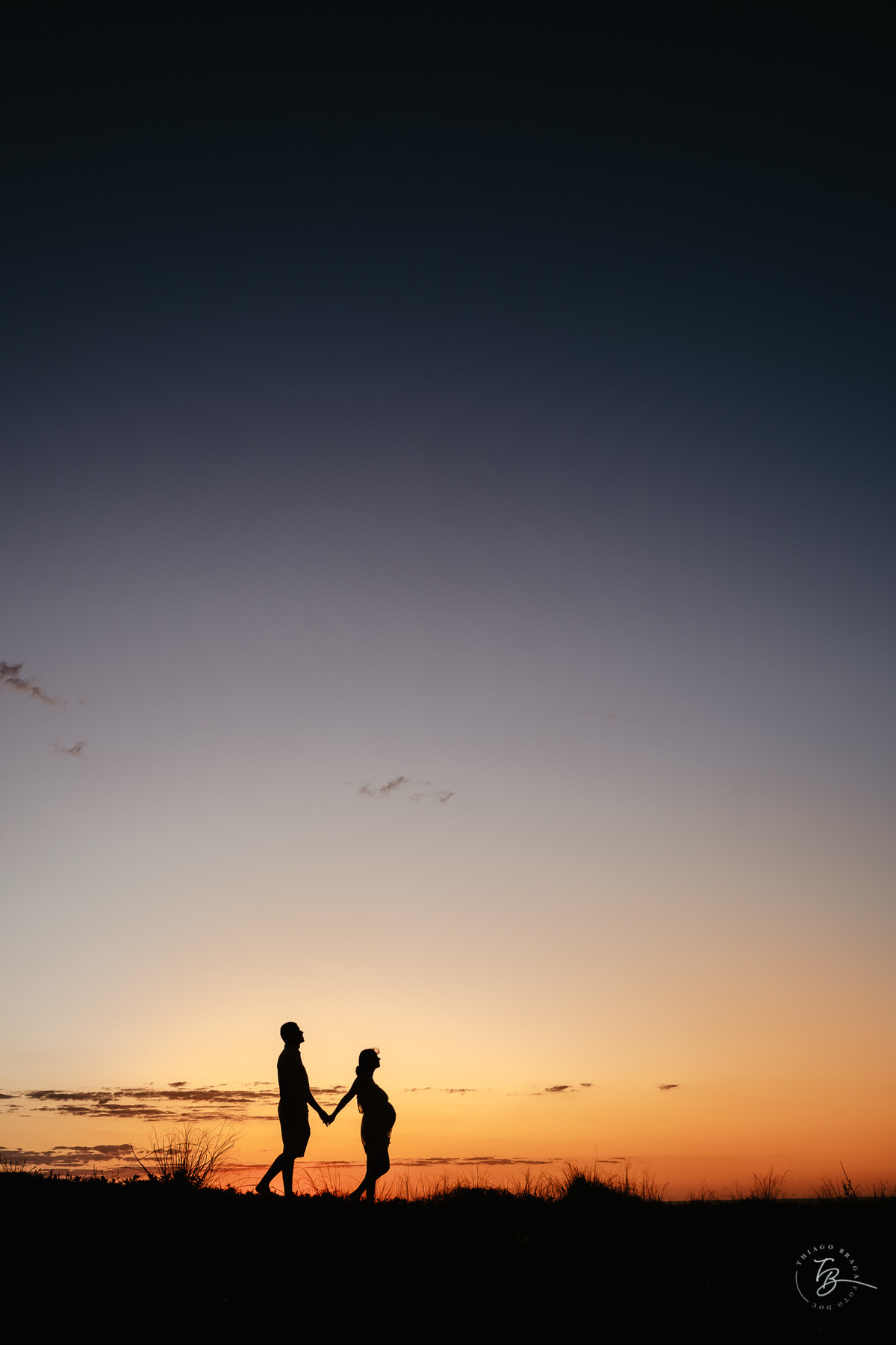 ensaio gestante no amanhecer na praia do campeche em Florianópolis, por Thiago Braga Fotografia