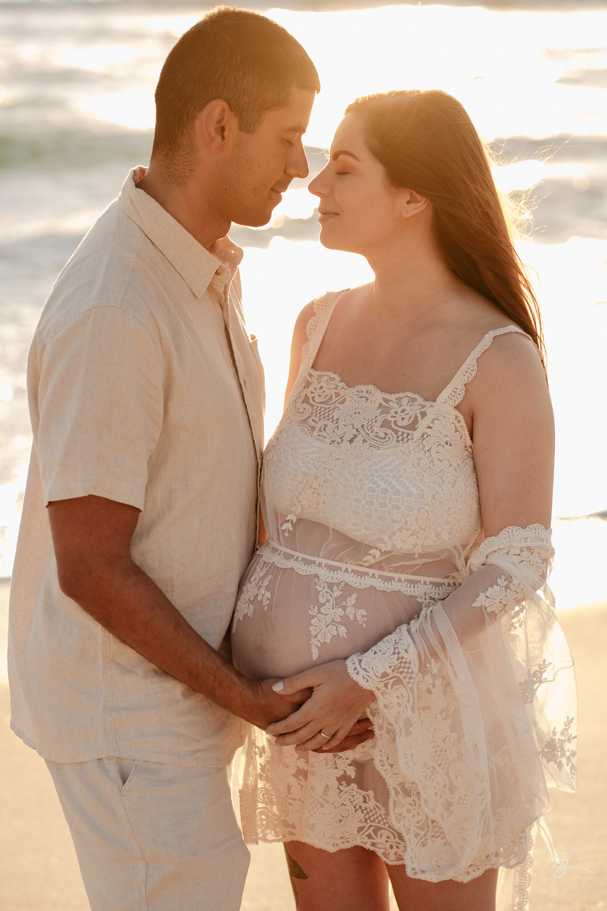 ensaio gestante no amanhecer na praia do campeche em Florianópolis, por Thiago Braga Fotografia