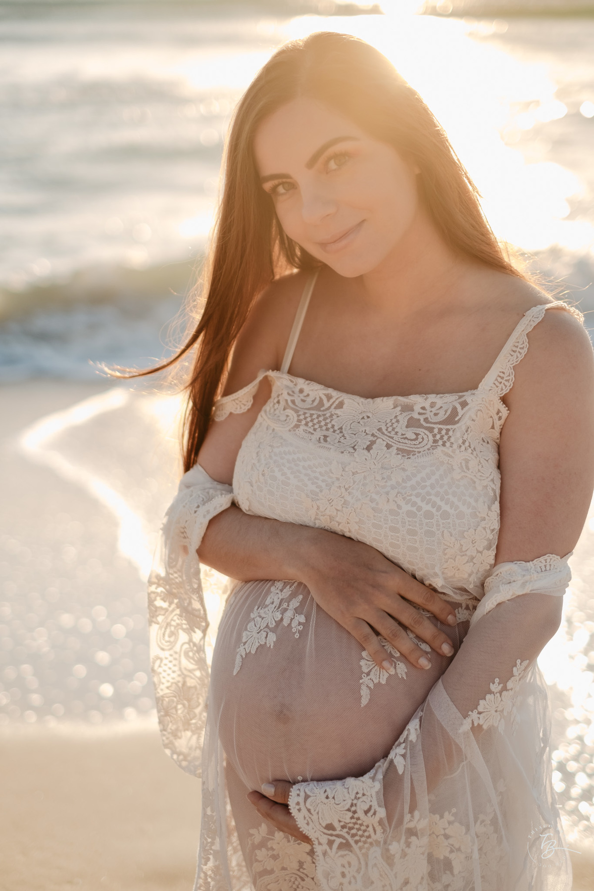 ensaio gestante no amanhecer na praia do campeche em Florianópolis, por Thiago Braga Fotografia