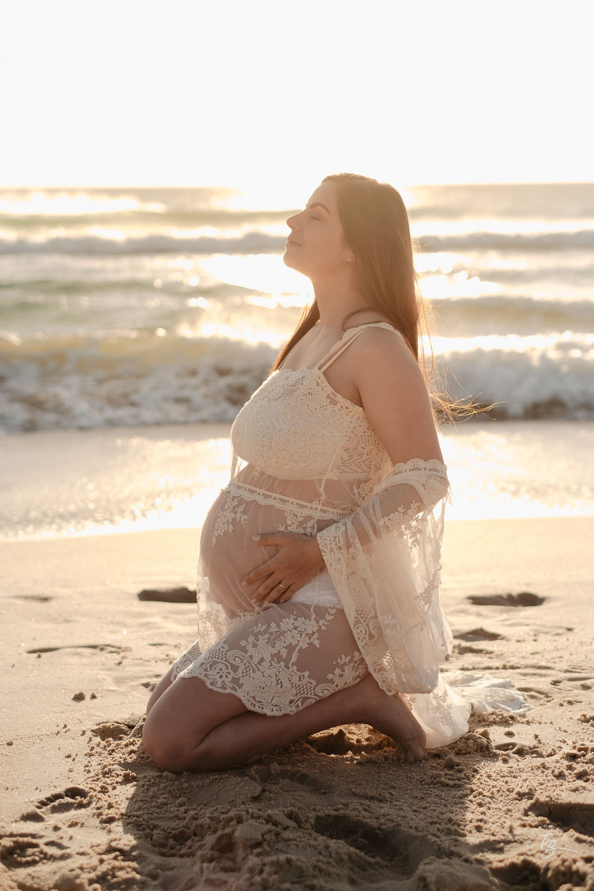 ensaio gestante no amanhecer na praia do campeche em Florianópolis, por Thiago Braga Fotografia