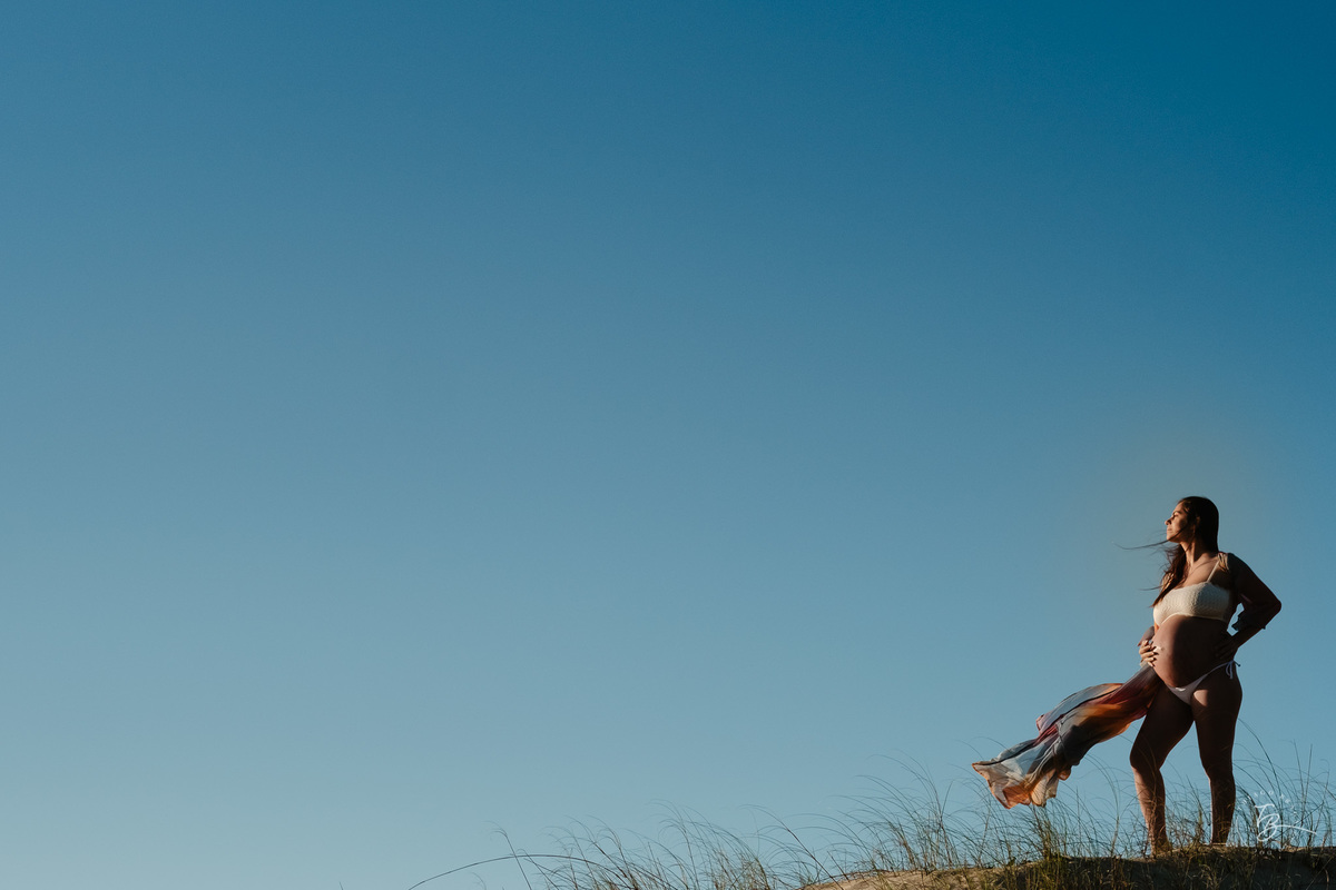 ensaio gestante no amanhecer na praia do campeche em Florianópolis, por Thiago Braga Fotografia