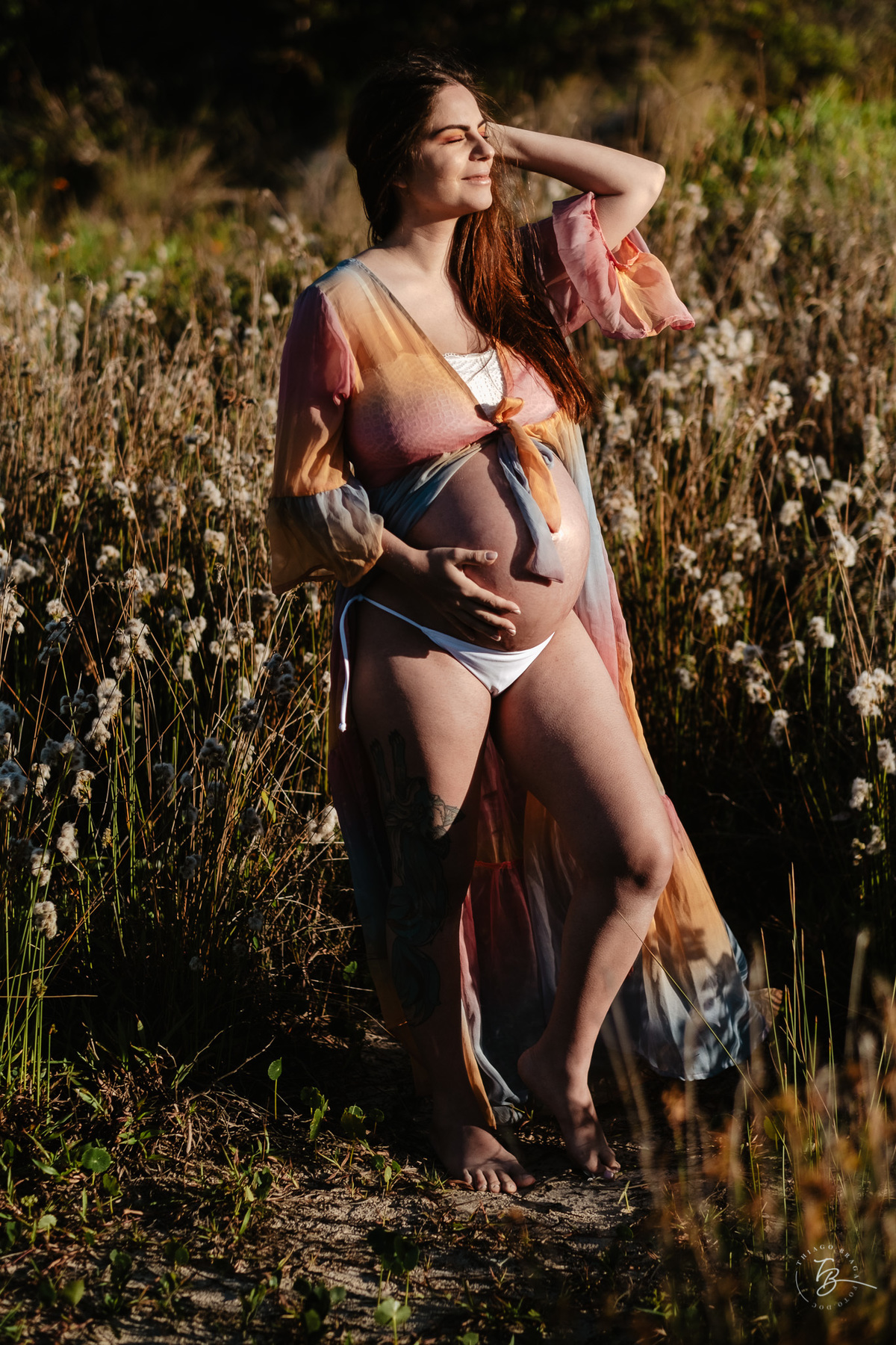 ensaio gestante no amanhecer na praia do campeche em Florianópolis, por Thiago Braga Fotografia