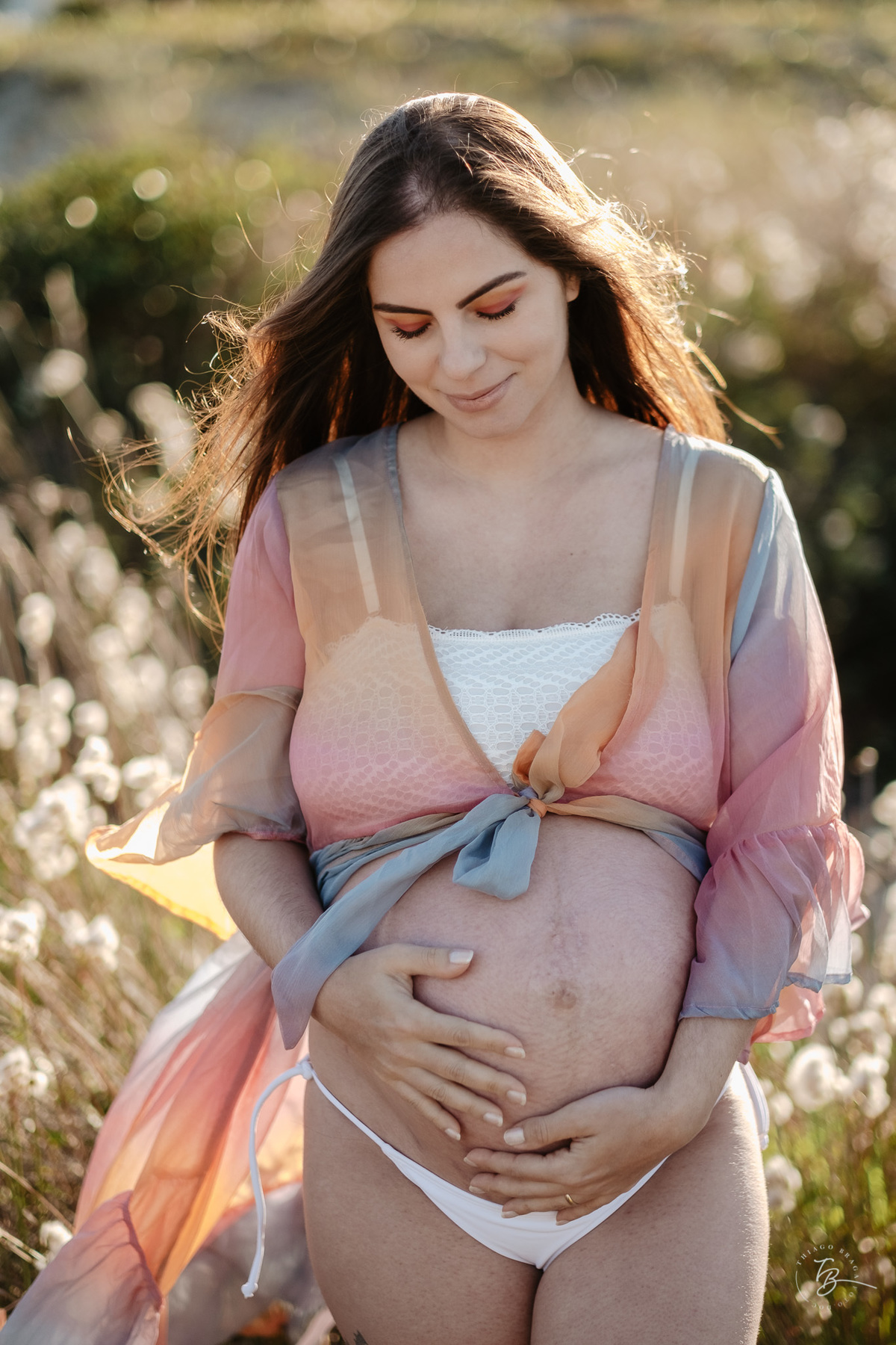 ensaio gestante no amanhecer na praia do campeche em Florianópolis, por Thiago Braga Fotografia