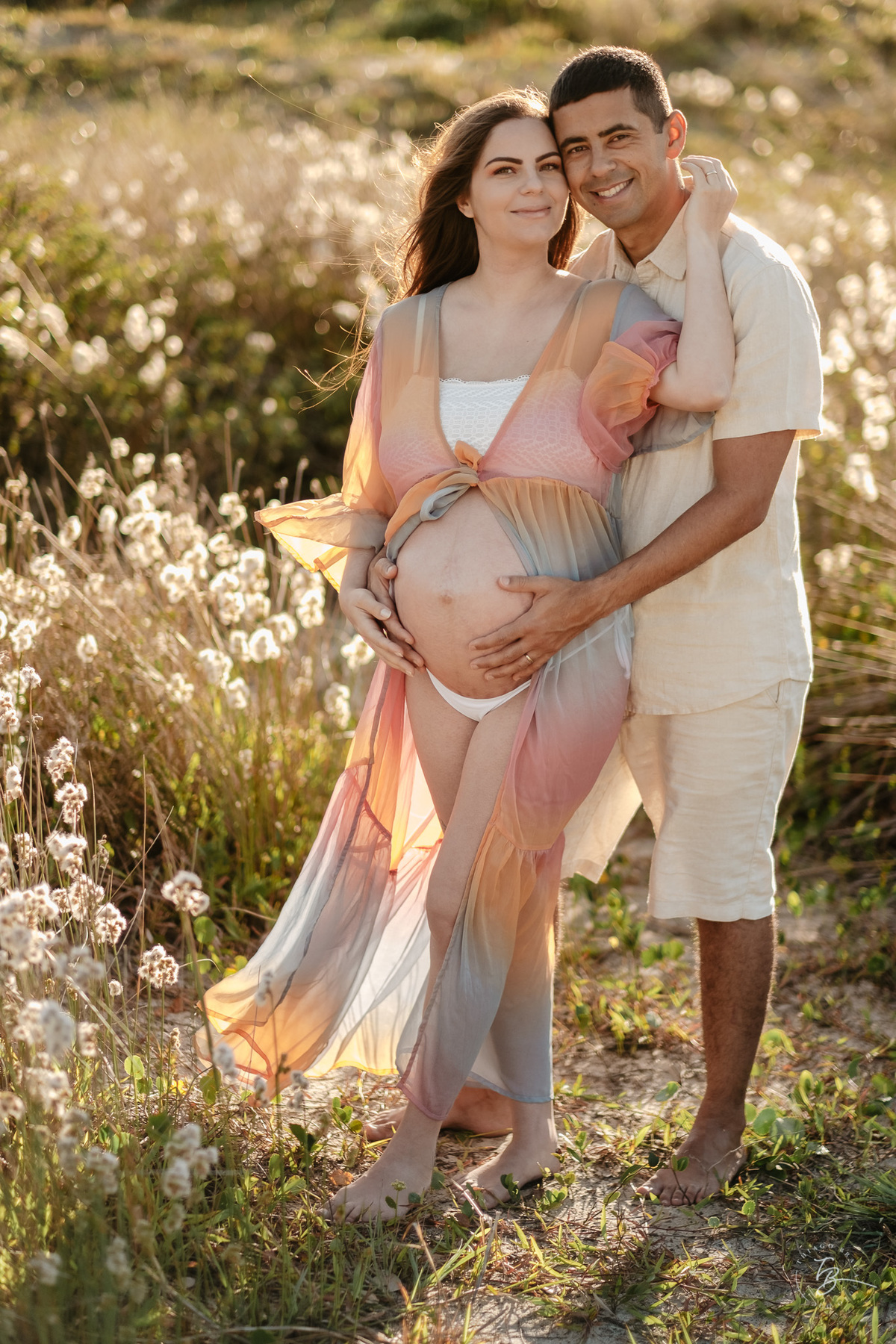 ensaio gestante no amanhecer na praia do campeche em Florianópolis, por Thiago Braga Fotografia