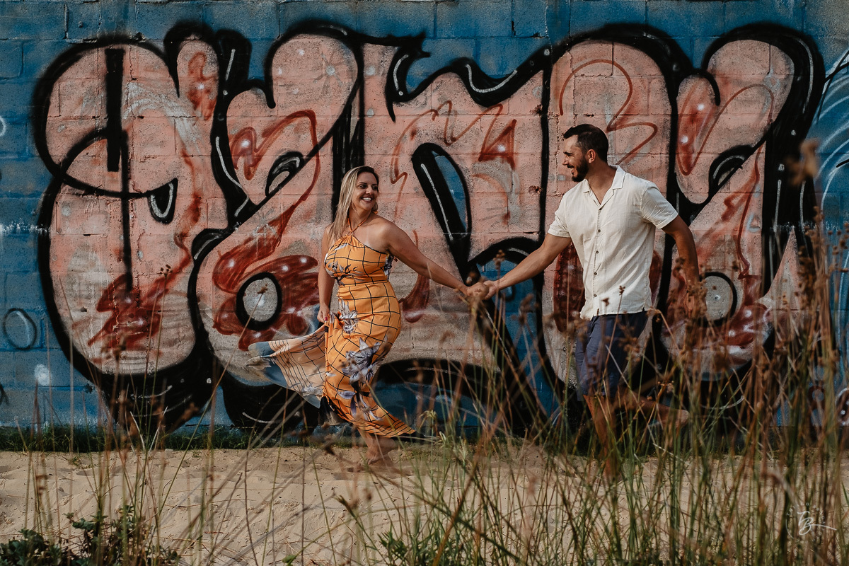 Fotografia de nascer do Sol, ensaio casal, praia do campeche em Florianópolis-SC.