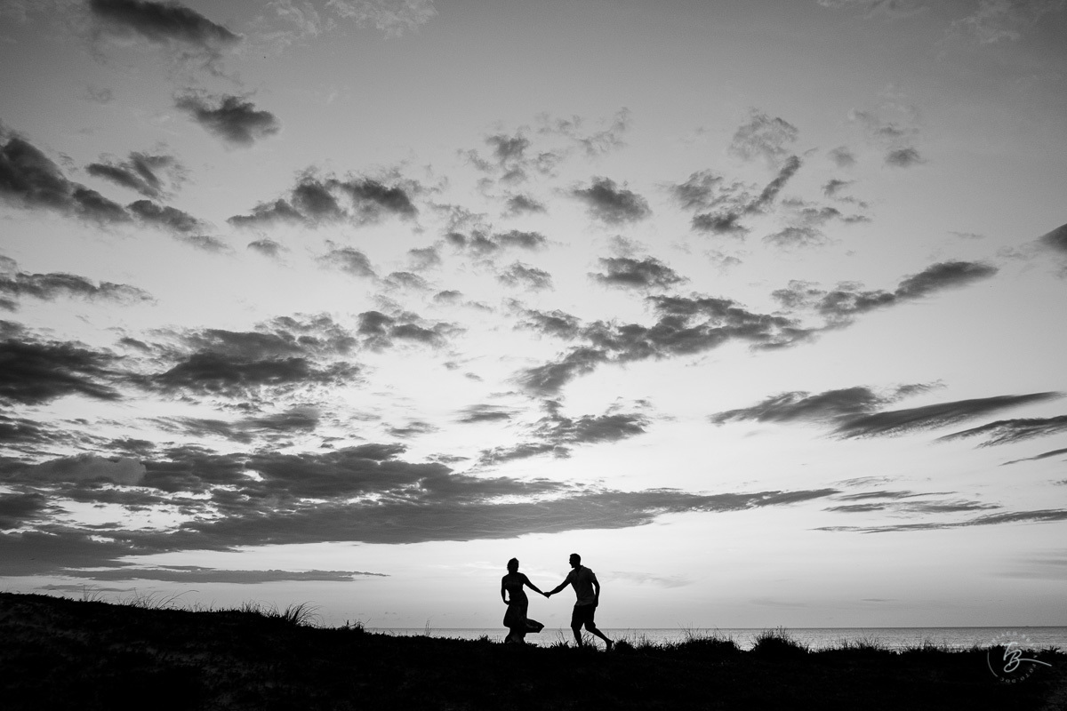Fotografia de nascer do Sol, ensaio casal, praia do campeche em Florianópolis-SC.