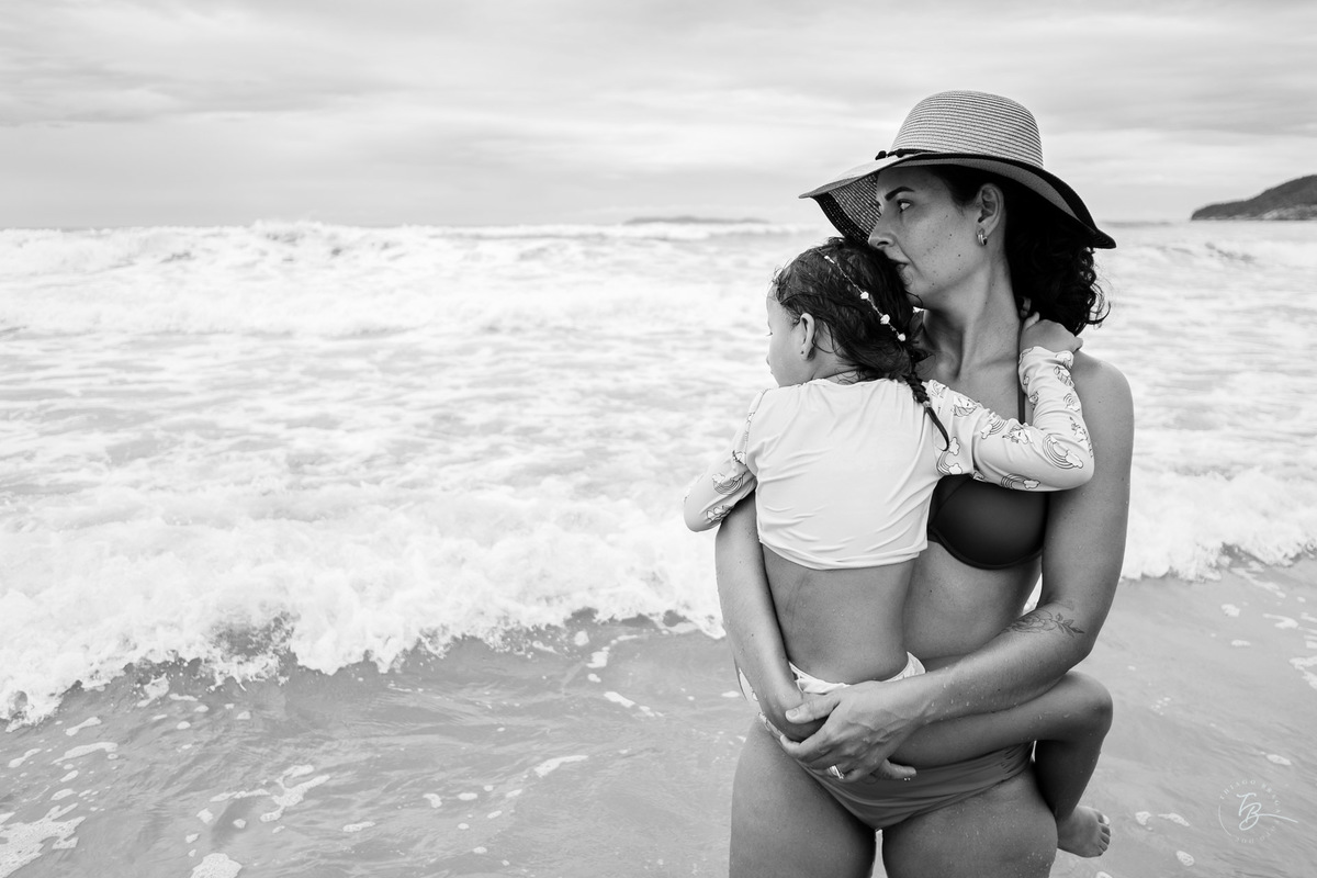 Fotografia documental da família Barbosa, na cidade de Bombinhas/SC. Fotos de um de férias por Thiago Braga.