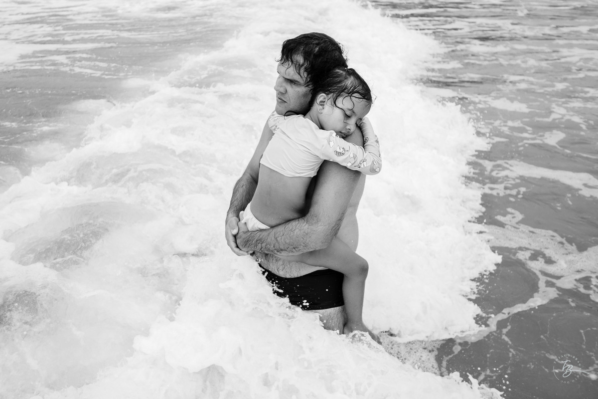 Fotografia documental da família Barbosa, na cidade de Bombinhas/SC. Fotos de um de férias por Thiago Braga.