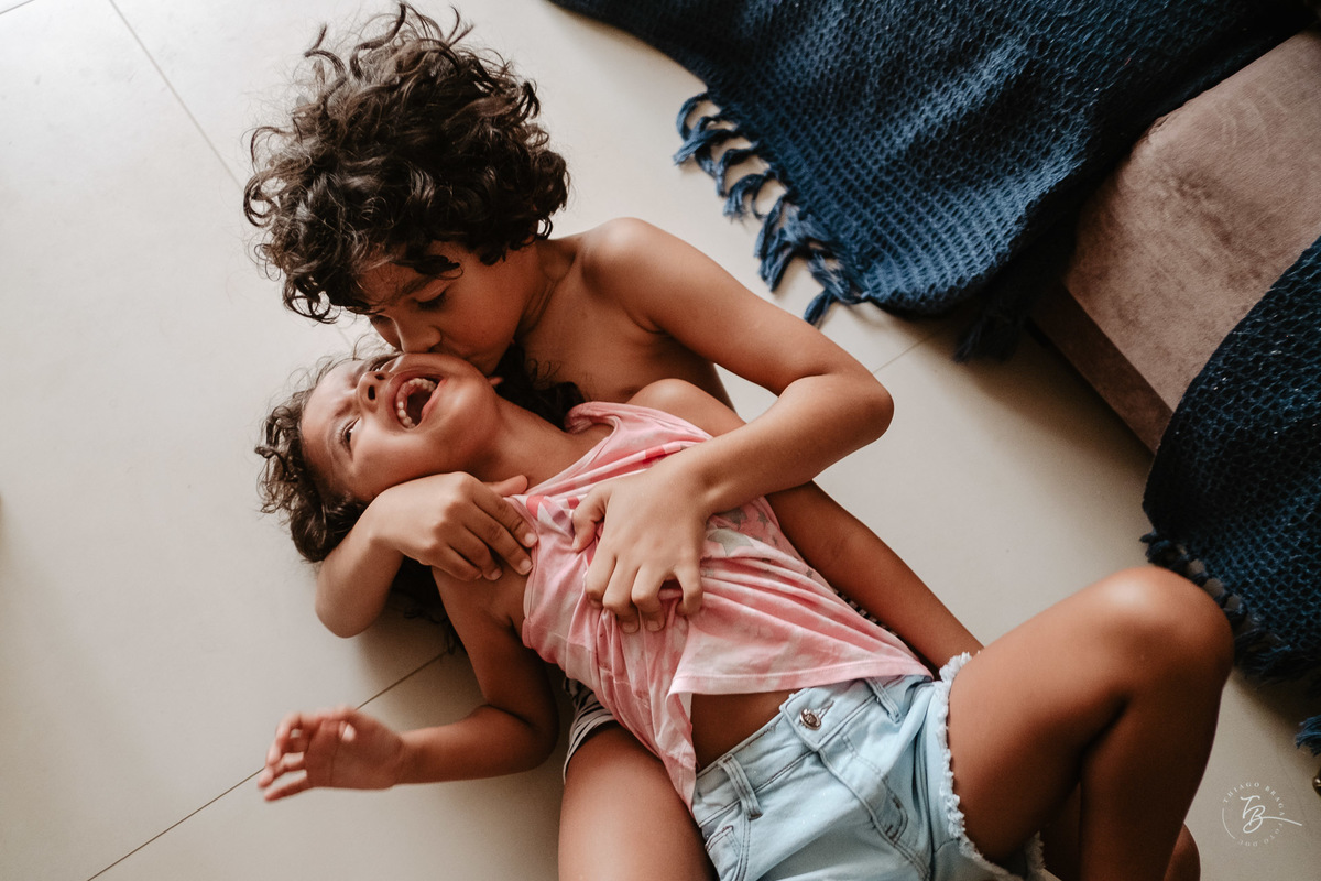 Fotografia documental da família Barbosa, na cidade de Bombinhas/SC. Fotos de um de férias por Thiago Braga.