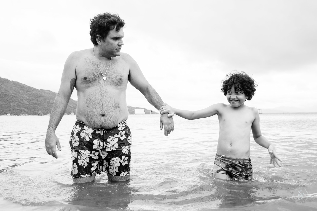 Fotografia documental da família Barbosa, na cidade de Bombinhas/SC. Fotos de um de férias por Thiago Braga.