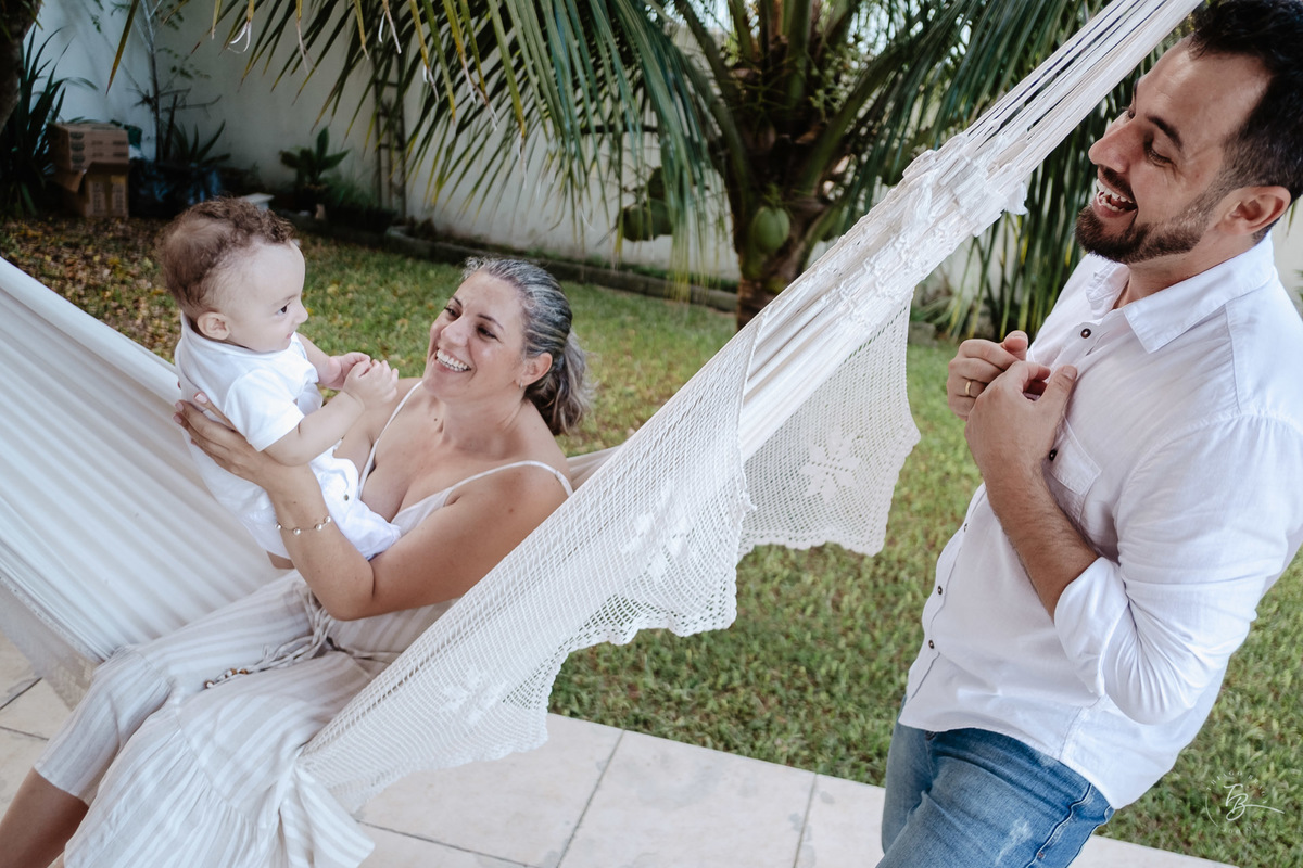Fotografia Documental do Dia do Batizado do Davi, nos Ingleses em Florianópolis, por Thiago Braga fotografia