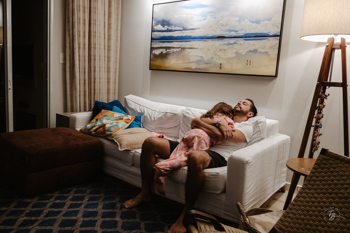 Fotografia documental de família. Um dia de férias da família Chaves Souza, na praia do Santinho em Florianópolis- SC por Thiago Braga fotografia. 