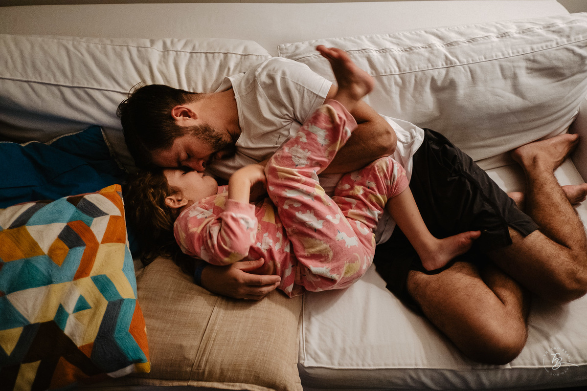 Fotografia documental de família. Um dia de férias da família Chaves Souza, na praia do Santinho em Florianópolis- SC por Thiago Braga fotografia. 