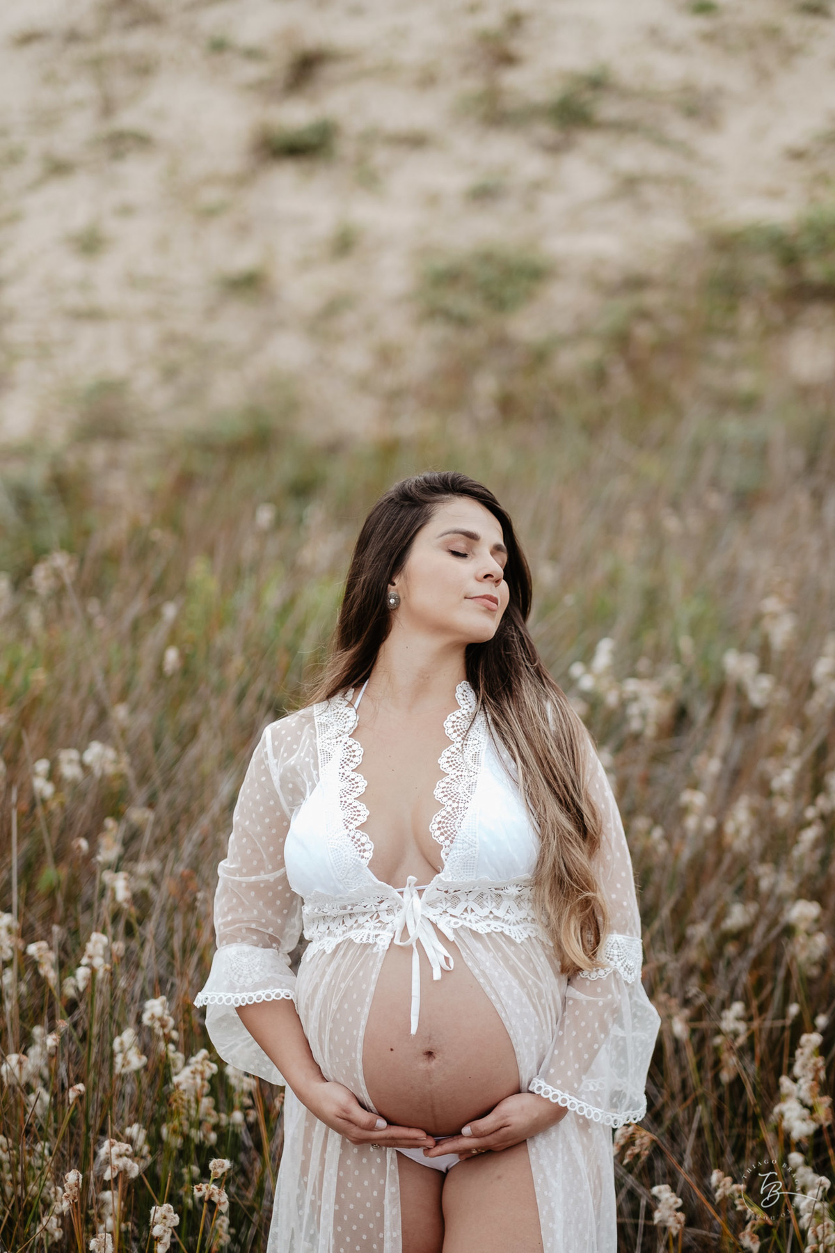 ensaio gestante em fim de tarde na praia do campeche