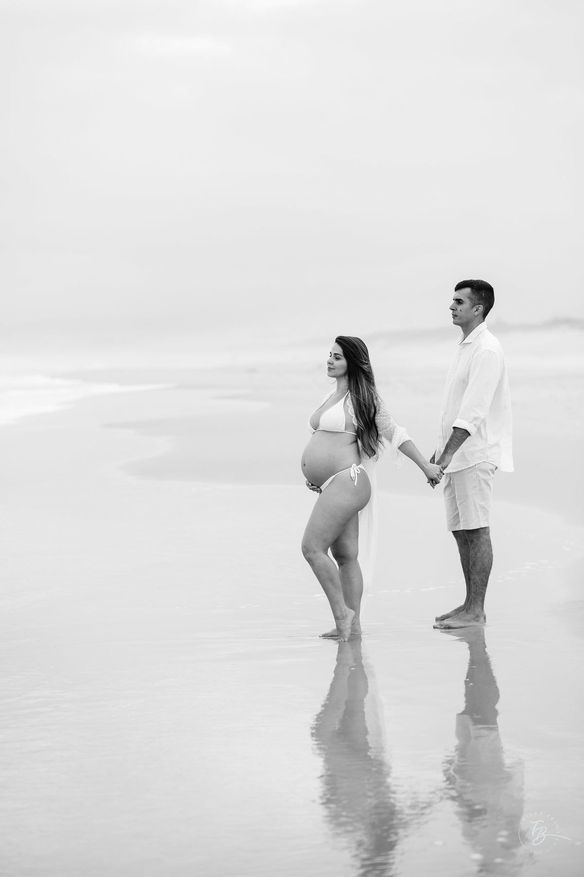 ensaio gestante em fim de tarde na praia do campeche