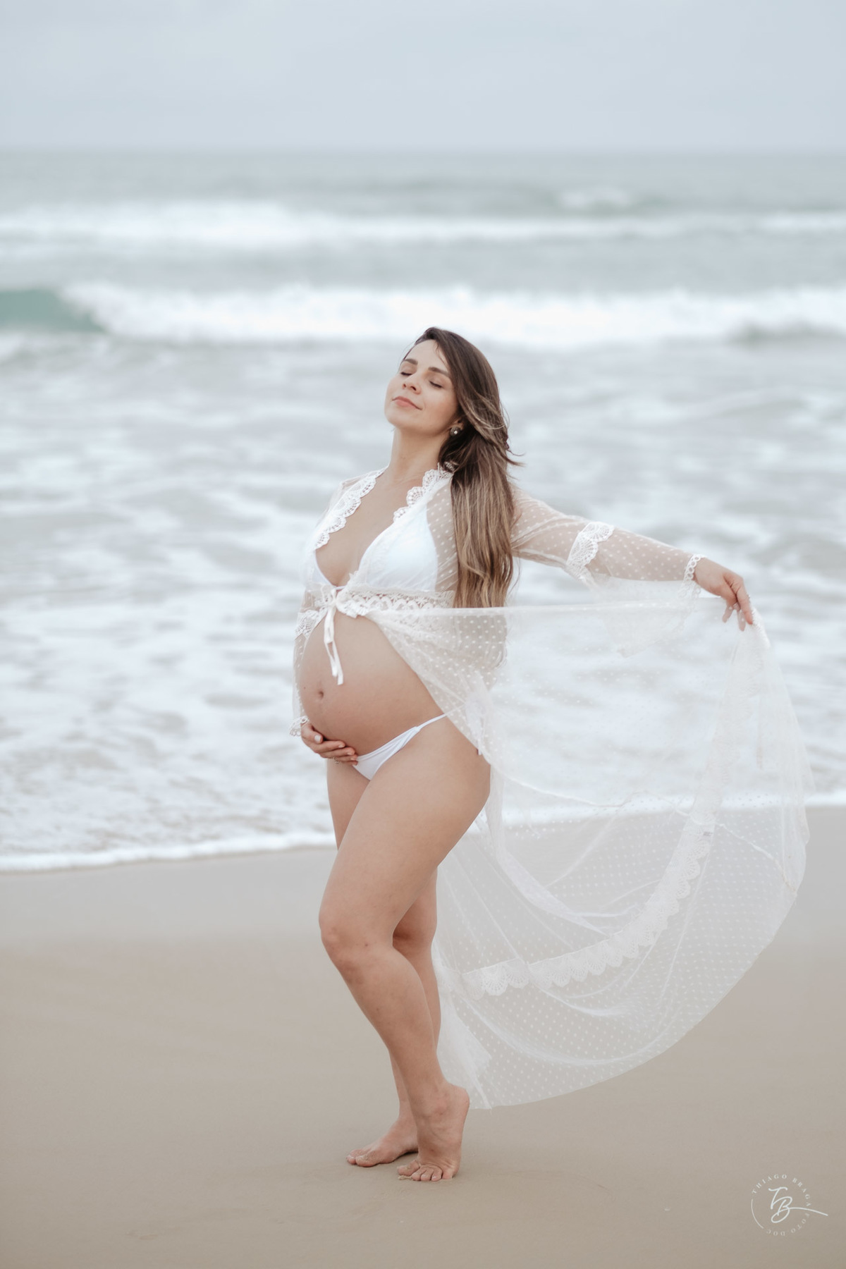 ensaio gestante em fim de tarde na praia do campeche