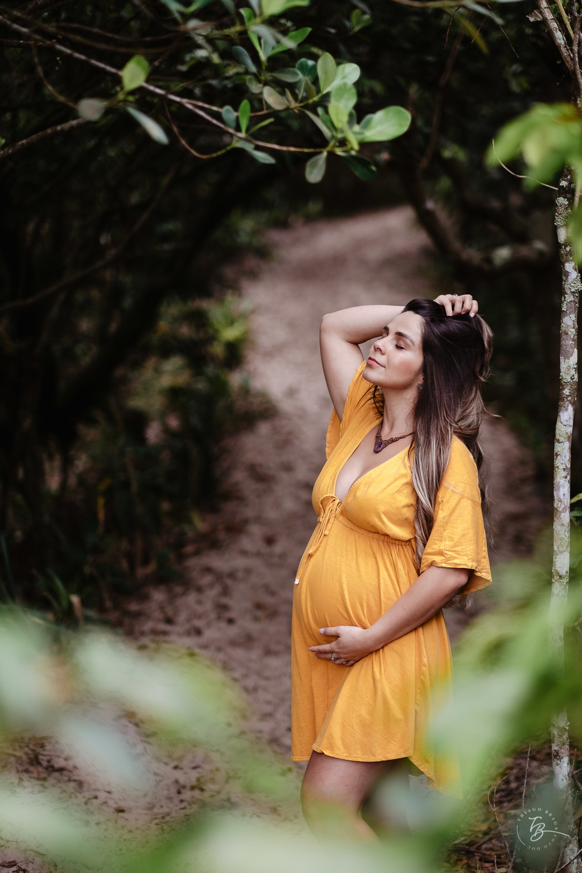 ensaio gestante em fim de tarde na praia do campeche