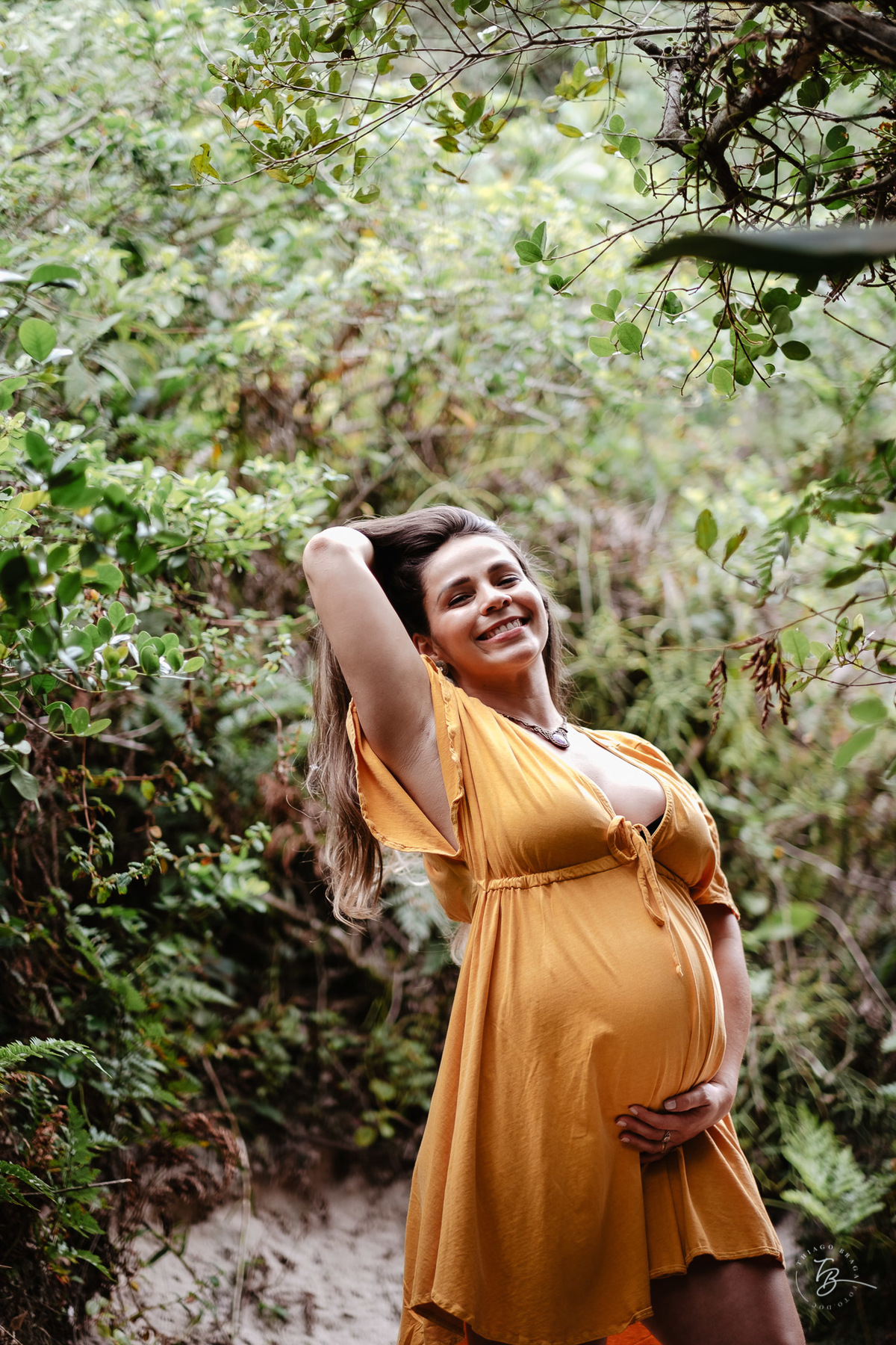 ensaio gestante em fim de tarde na praia do campeche