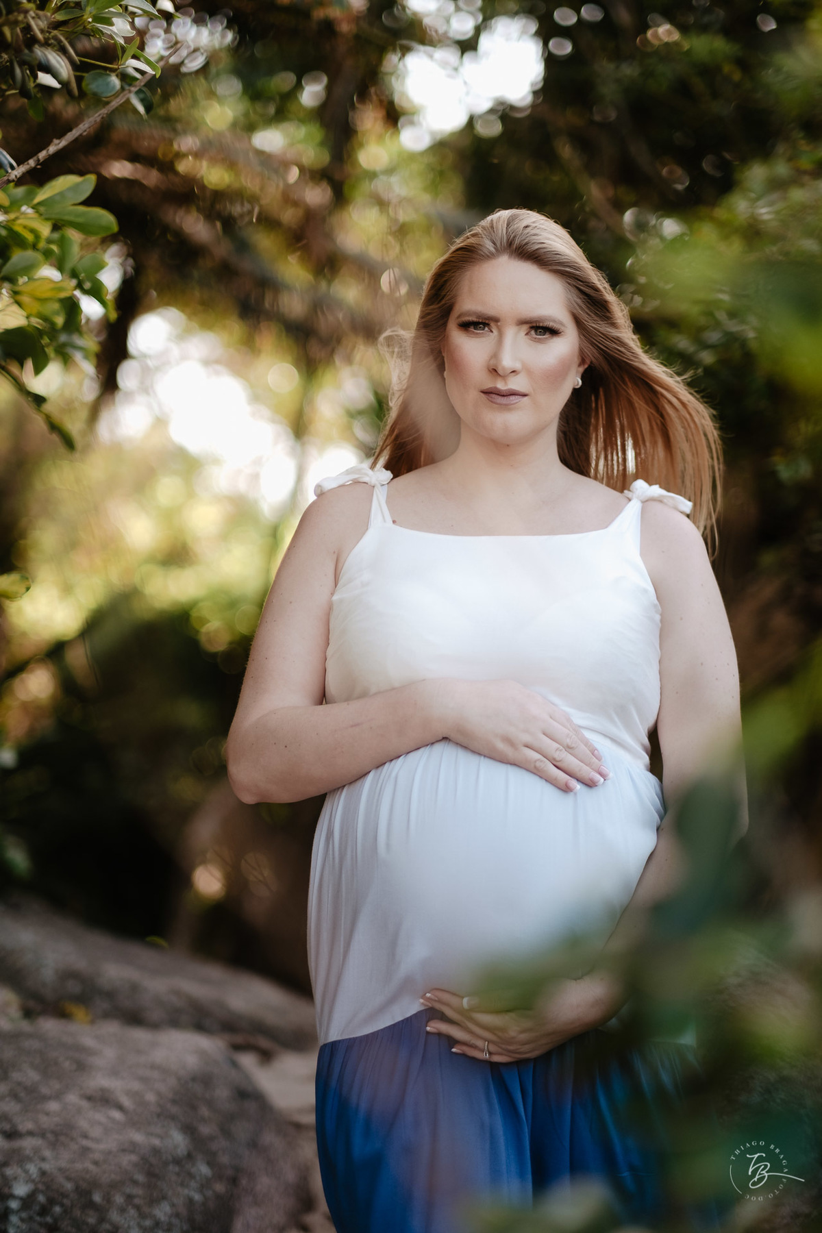 ensaio gestante da espera pelo Miguel, em um pô do Sol na praia de Canasjurê em Florianópolis/Sc por Thiago Braga fotografia. 