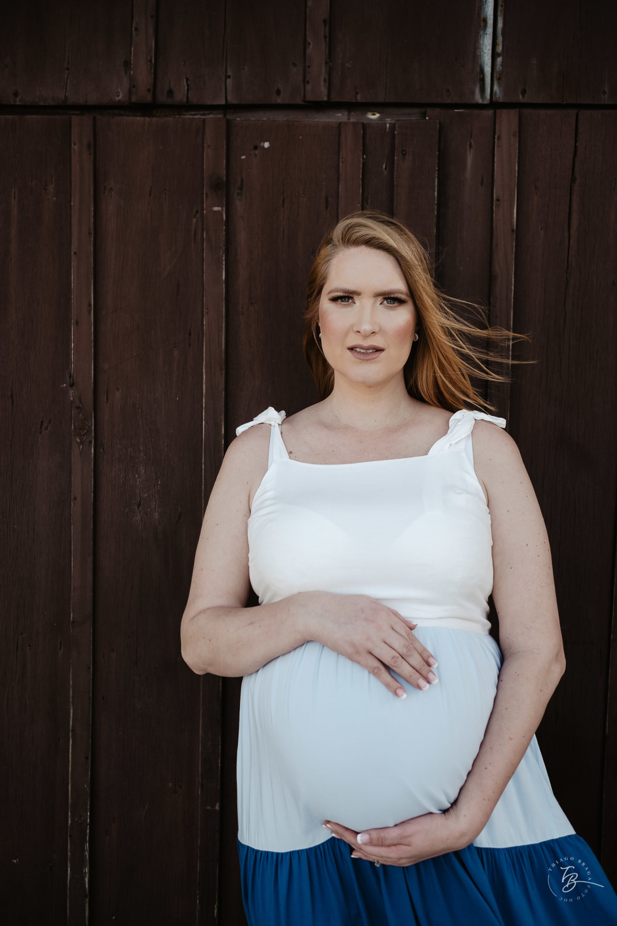 ensaio gestante da espera pelo Miguel, em um pô do Sol na praia de Canasjurê em Florianópolis/Sc por Thiago Braga fotografia. 