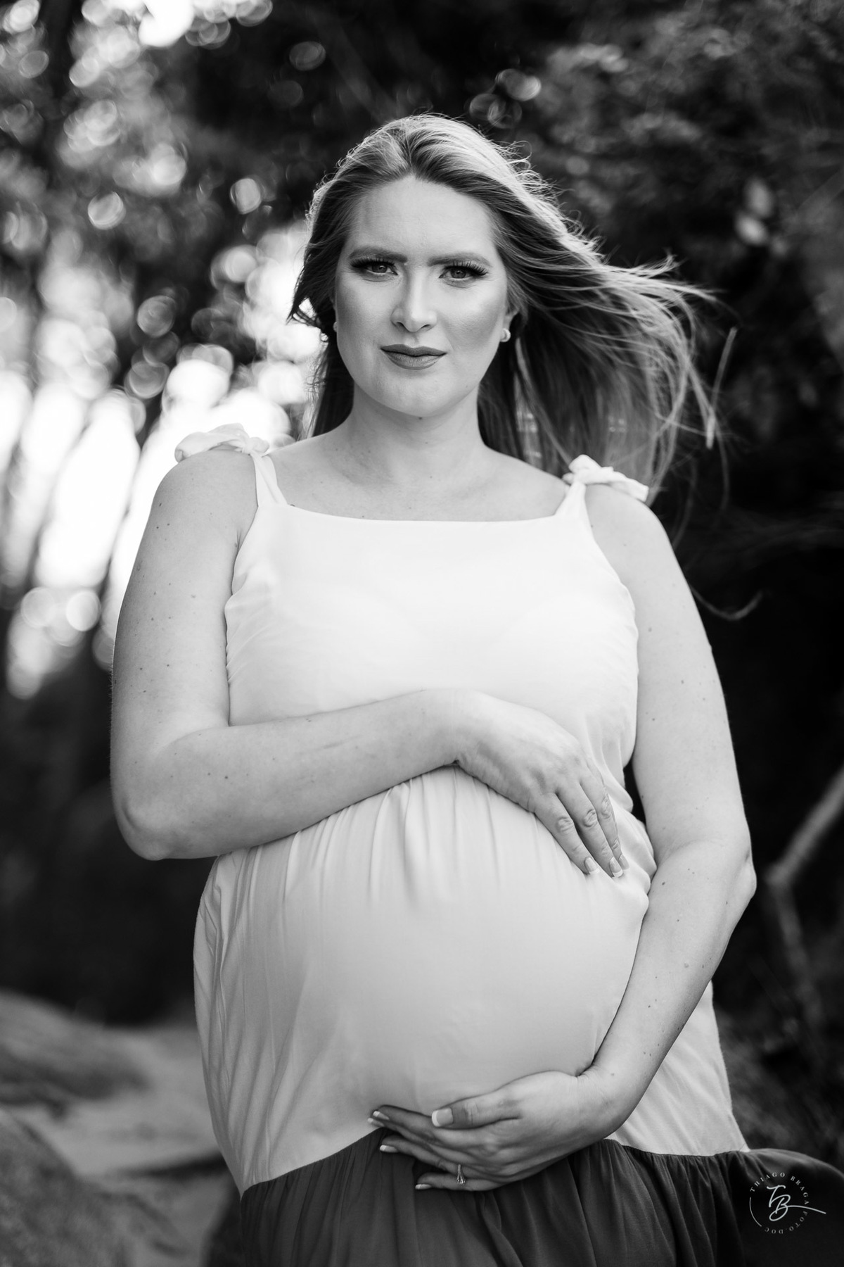 ensaio gestante da espera pelo Miguel, em um pô do Sol na praia de Canasjurê em Florianópolis/Sc por Thiago Braga fotografia. 