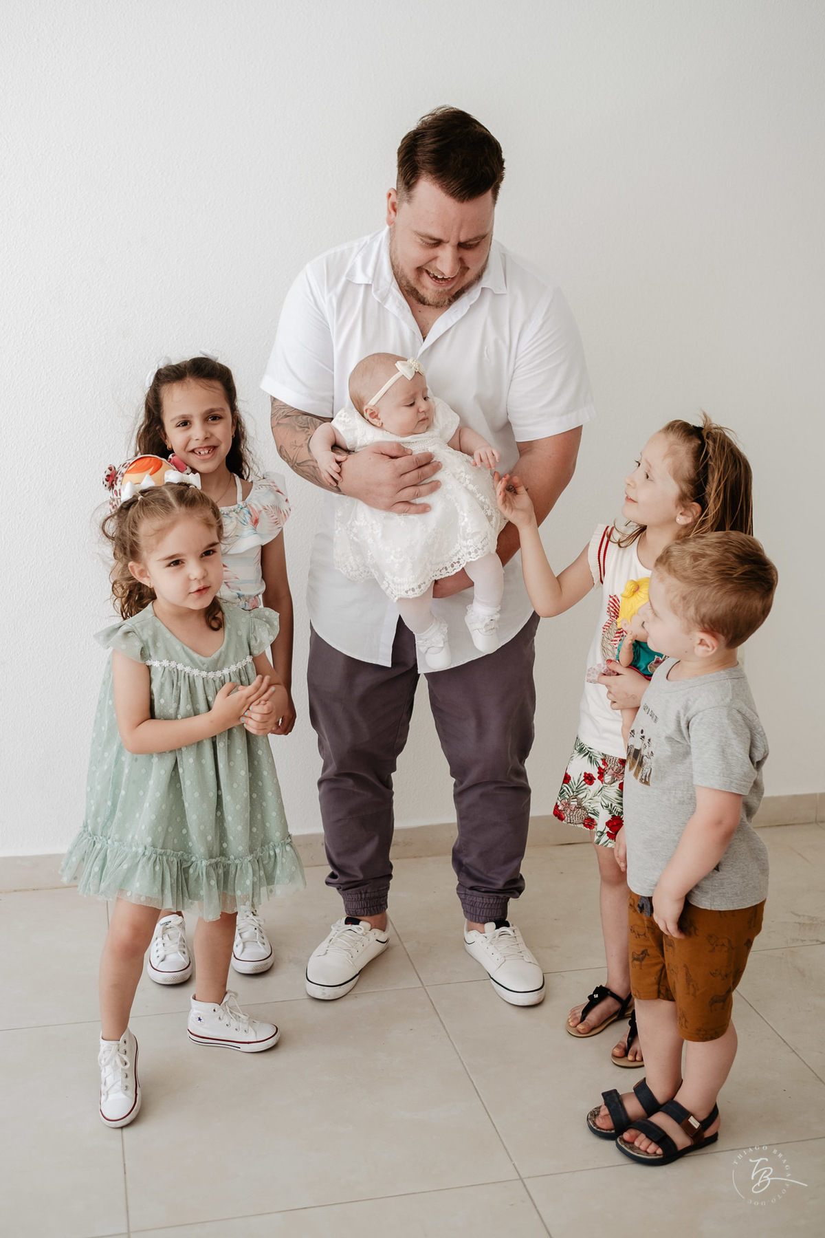 dia do batizado da Laura, por Thiago Braga fotografia. Documental de família