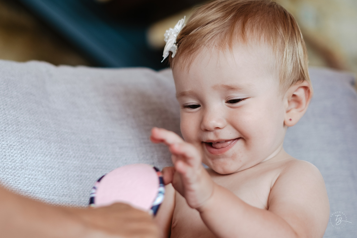 O dia do batizado da Manuela, na igreja da Lagoa da Conceição em Florianópolis, por Thiago Braga Fotografia