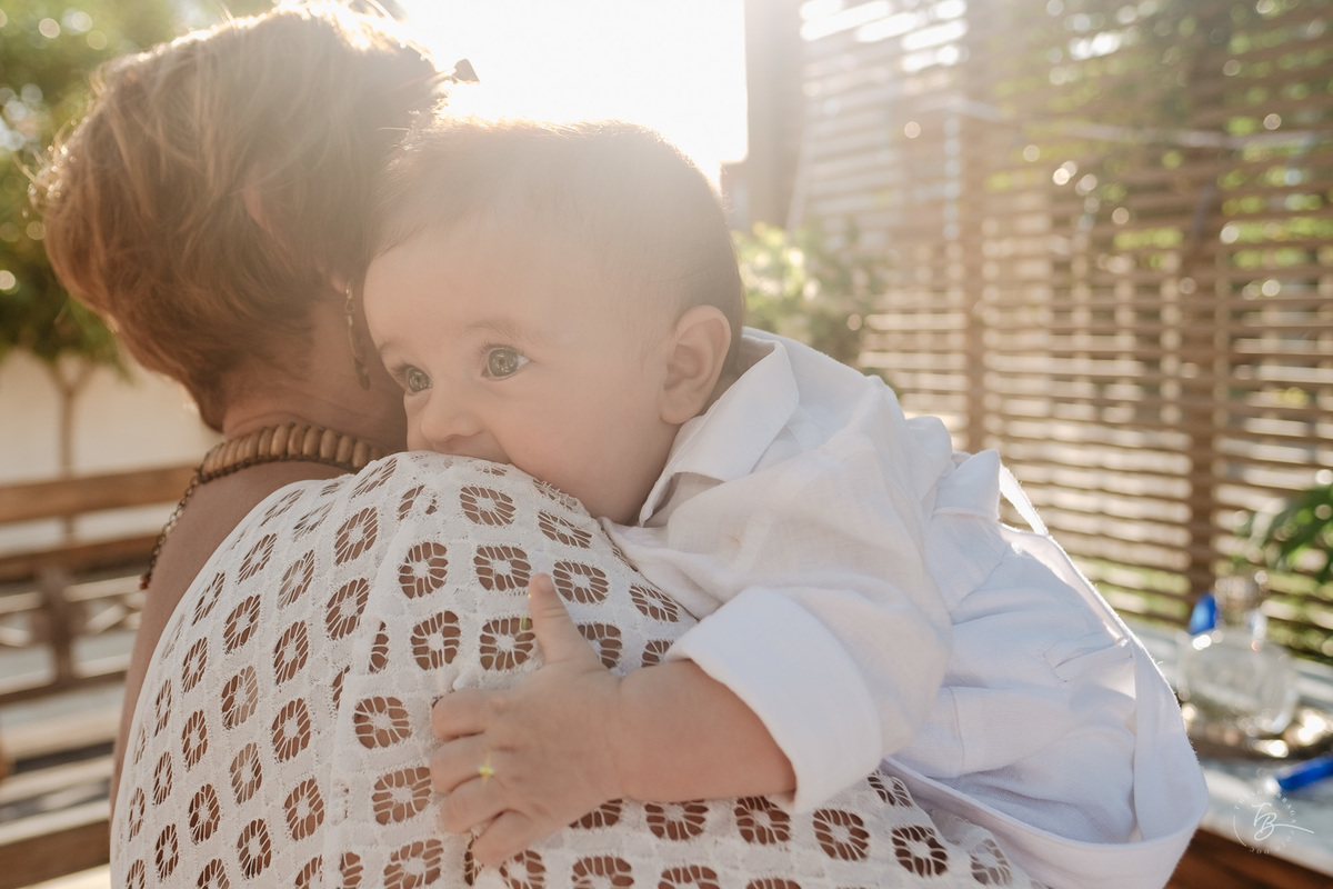 batizado documental da pousada beach house, na praia da Daniela em Florianópolis, por Thiago Braga fotografia