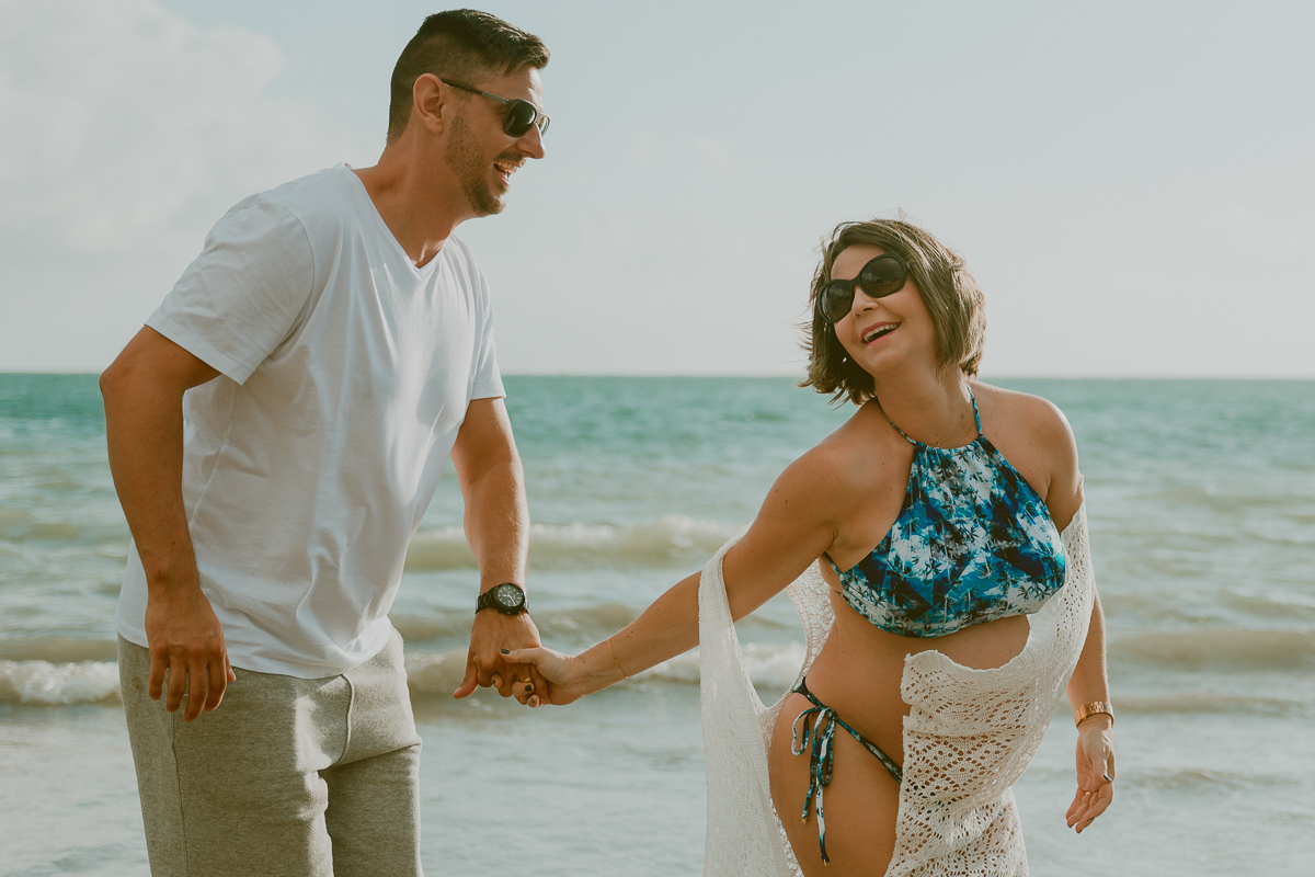 Ensaio fotográfico de família em praia de Maceió. Gabi Coêlho Fotografia. Fotógrafo Maceió. Ensaio Gestante.