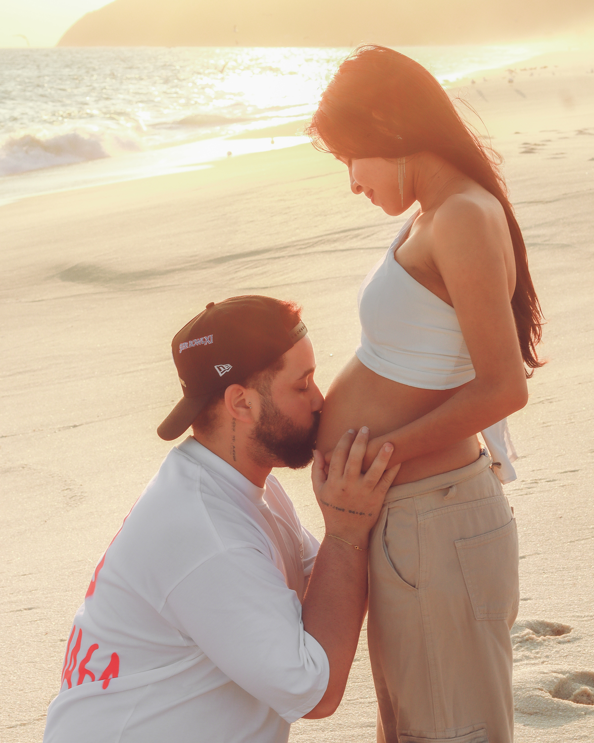 Pai
Menino
Praia
Mar
Por do sol