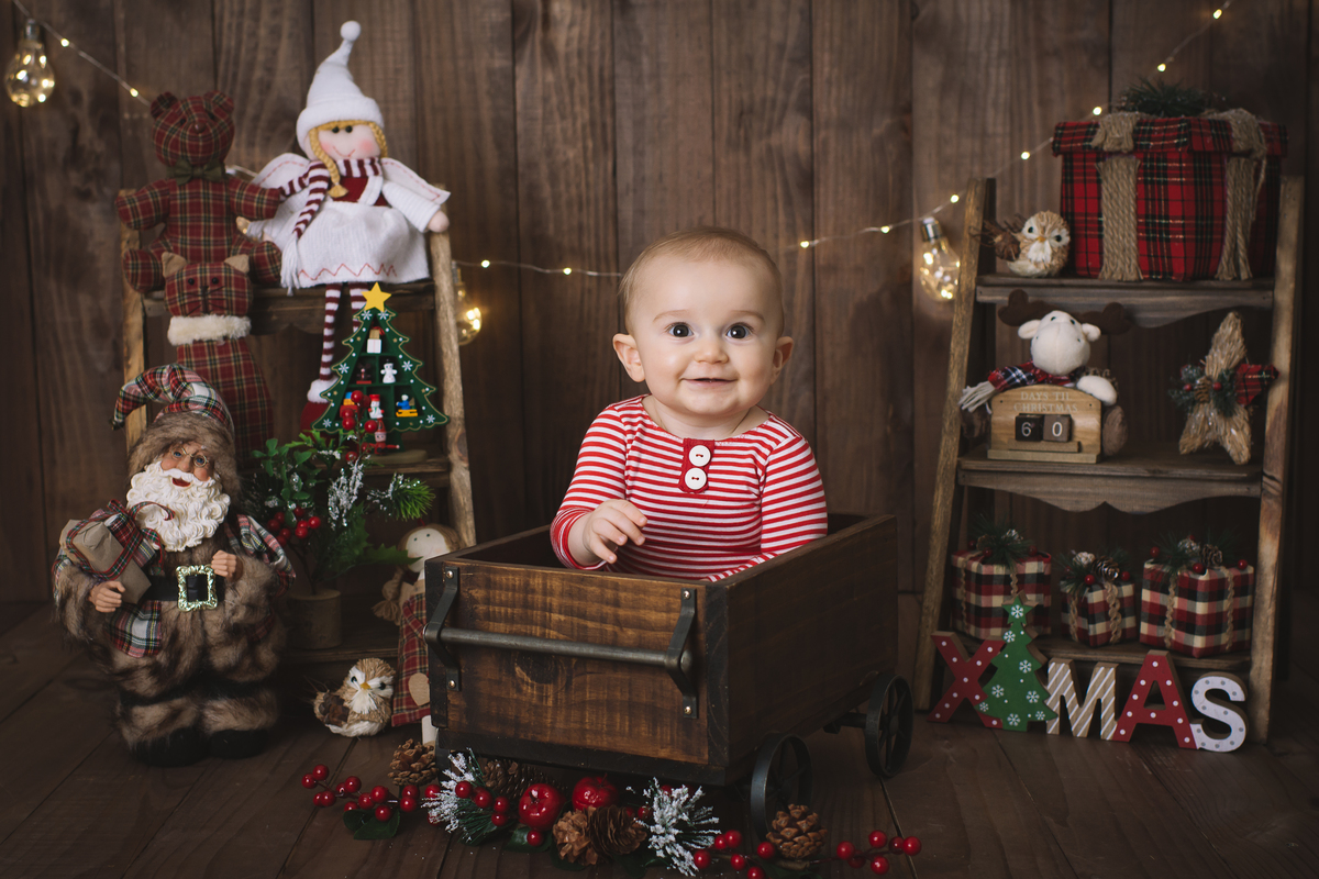 mini sessão de natal solidário, fotos de natal, ensaio de natal, fotografia infantil, foto de bebê, acompanhamento de bebês, acompanhamento fotográfico de bebês, estúdio fotográfico infantil Barra da Tijuca, melhor fotógrafa de bebês