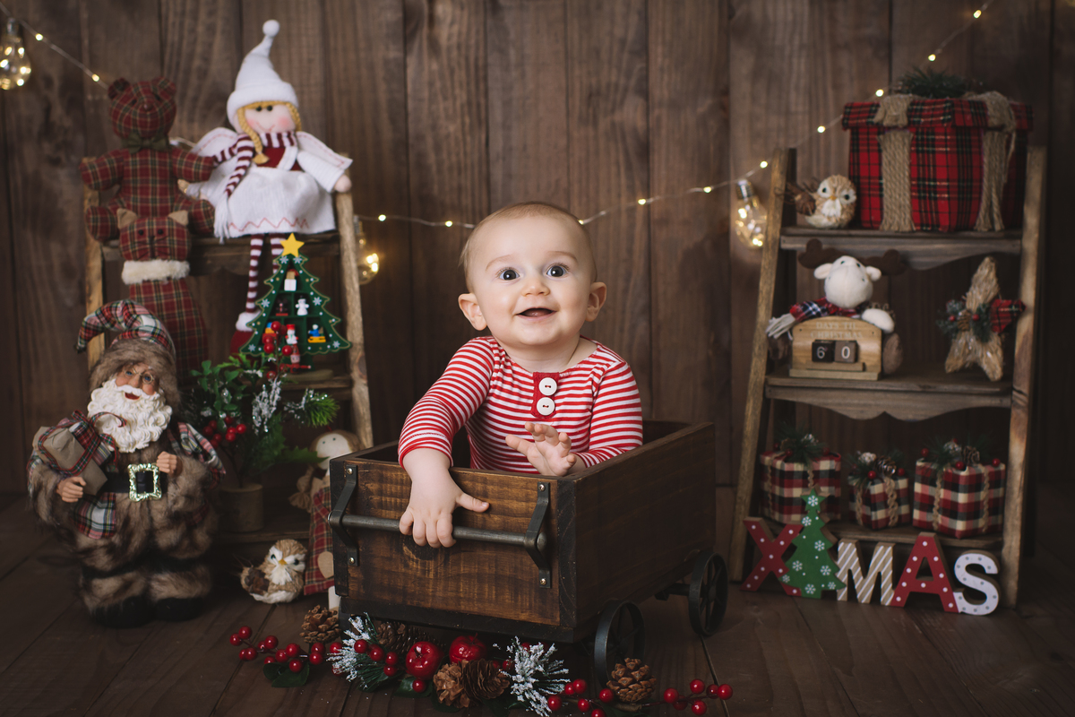 mini sessão de natal solidário, fotos de natal, ensaio de natal, fotografia infantil, foto de bebê, acompanhamento de bebês, acompanhamento fotográfico de bebês, estúdio fotográfico infantil Barra da Tijuca, melhor fotógrafa de bebês