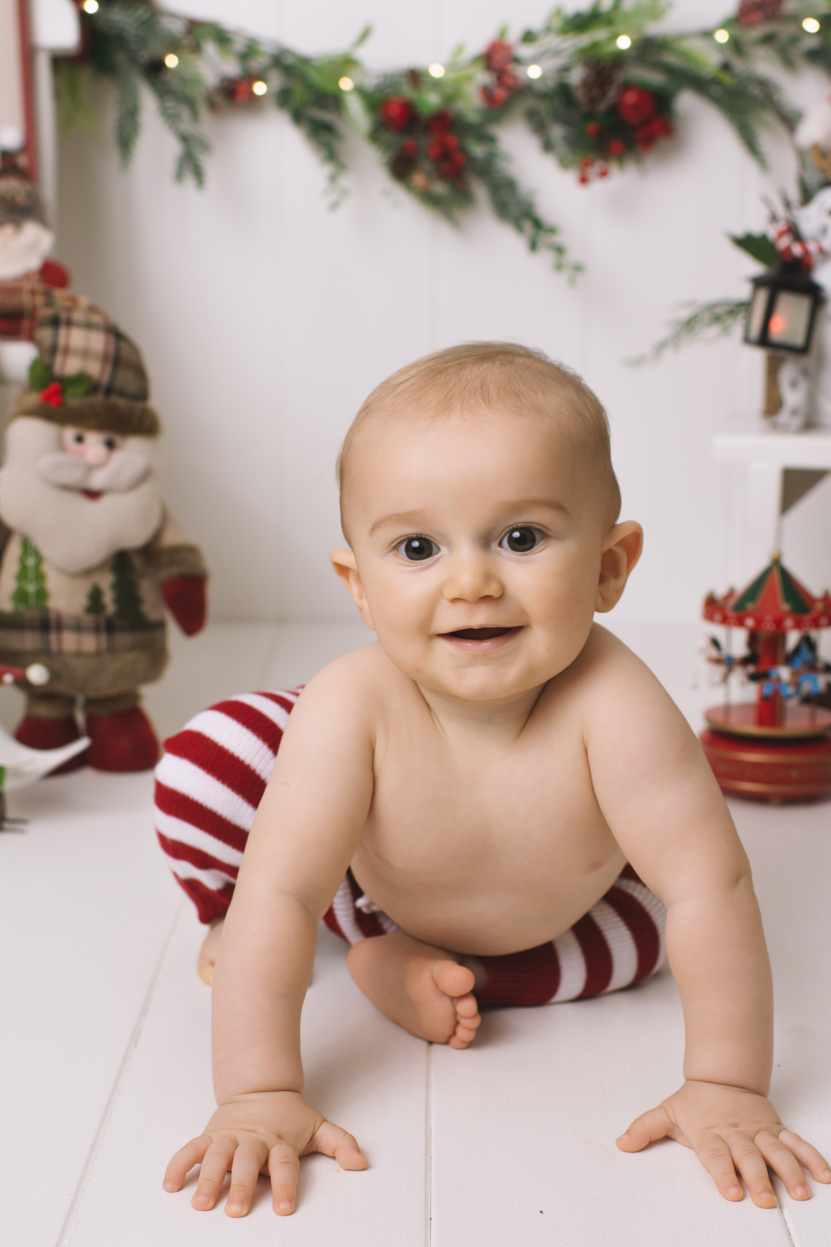 mini sessão de natal solidário, fotos de natal, ensaio de natal, fotografia infantil, foto de bebê, acompanhamento de bebês, acompanhamento fotográfico de bebês, estúdio fotográfico infantil Barra da Tijuca, melhor fotógrafa de bebês