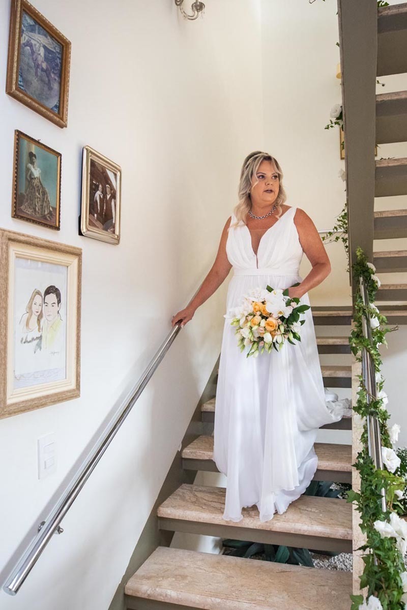 Noiva descendo as escadas