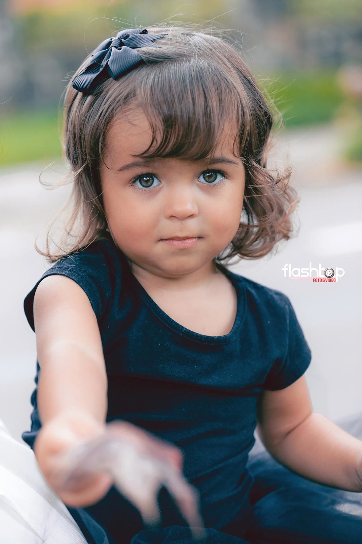 Antonella com a mamãe Cândida e papai Felipe.