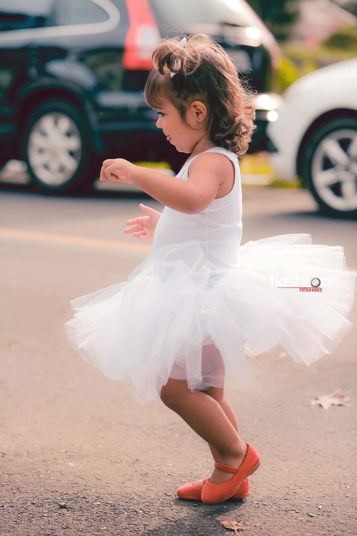 Antonella com a mamãe Cândida e papai Felipe.