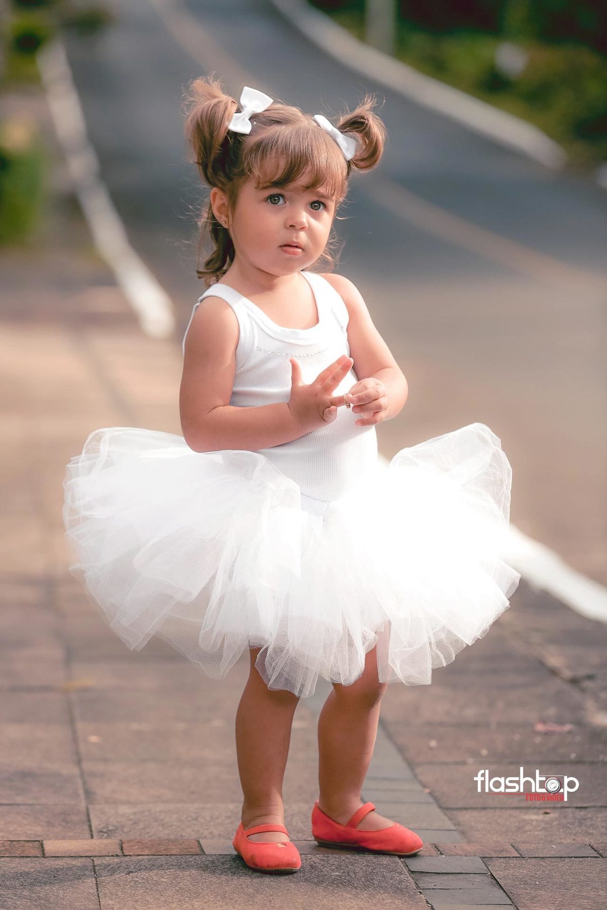 Antonella com a mamãe Cândida e papai Felipe.