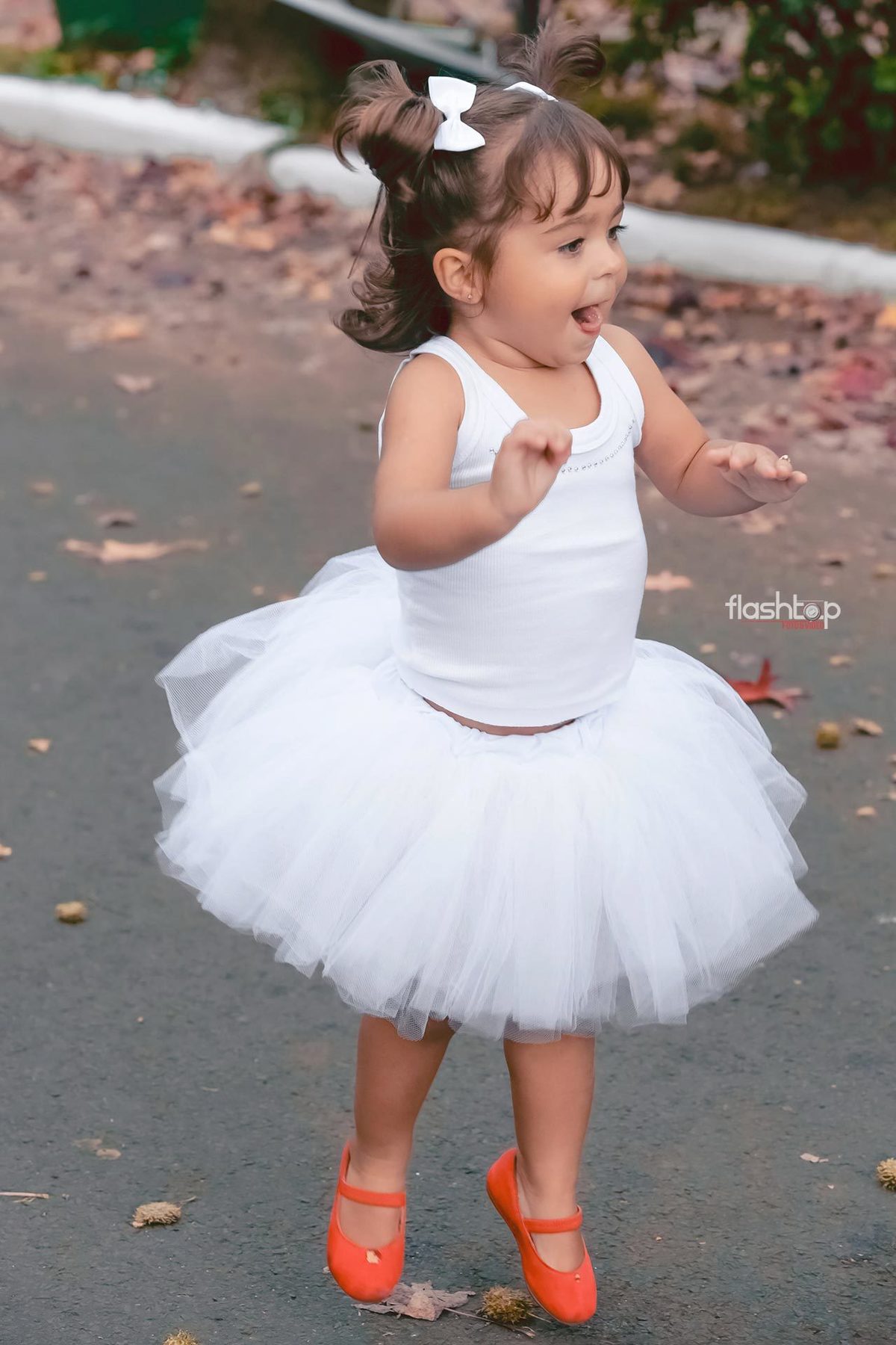 Antonella com a mamãe Cândida e papai Felipe.