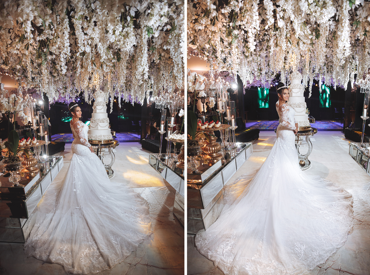 fotos noiva de branco vestido  sereia  com o bolo em decoração classica com flores no teto