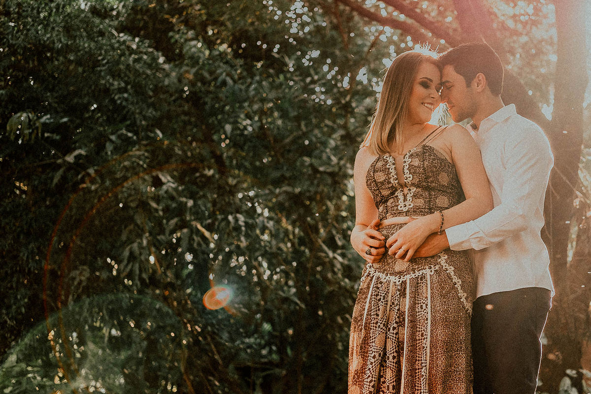 Foto de casal com Fler do Sol em Maringá-PR