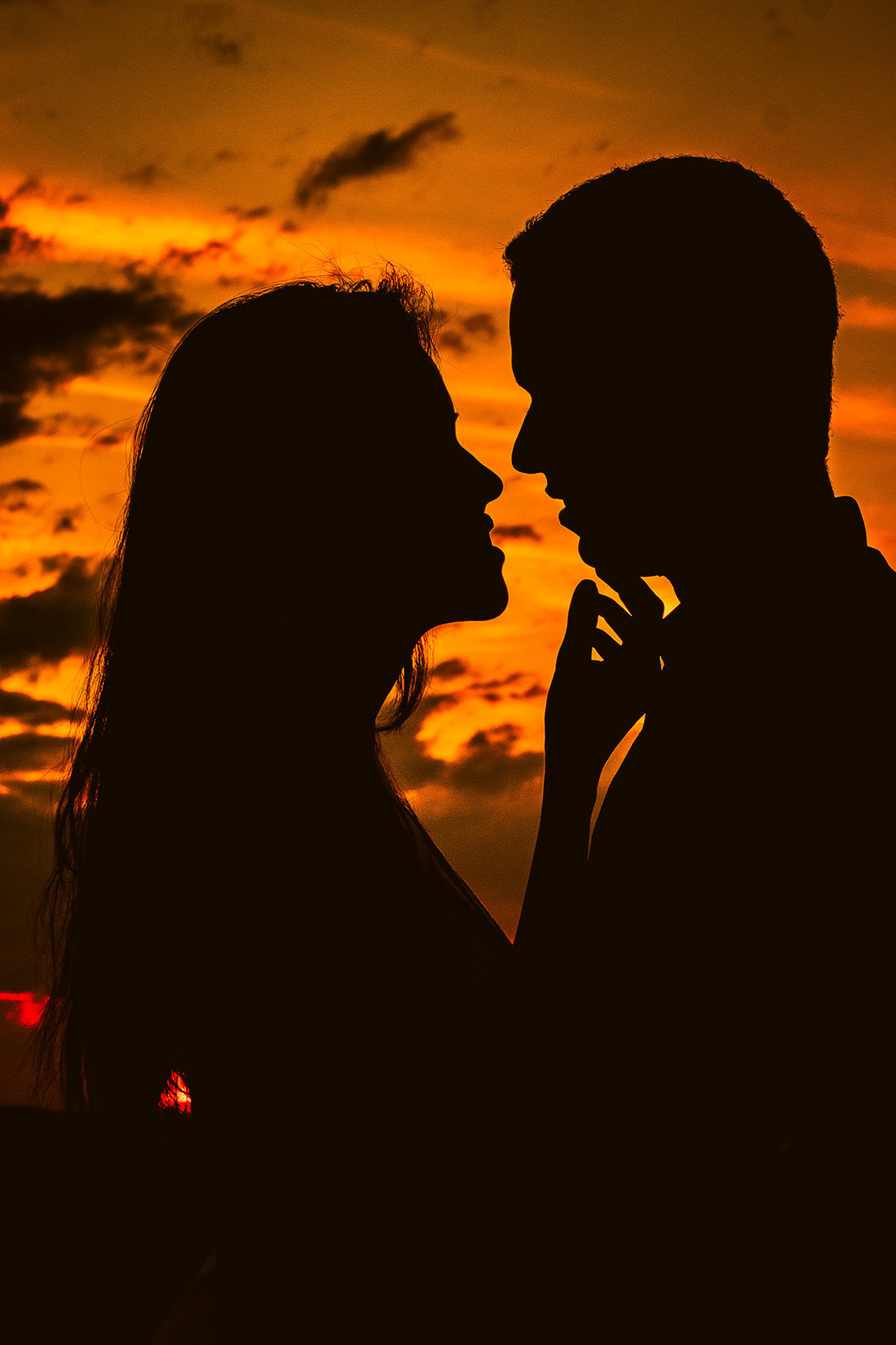 ensaio de Casal  com foto de silhueta no por do sol 