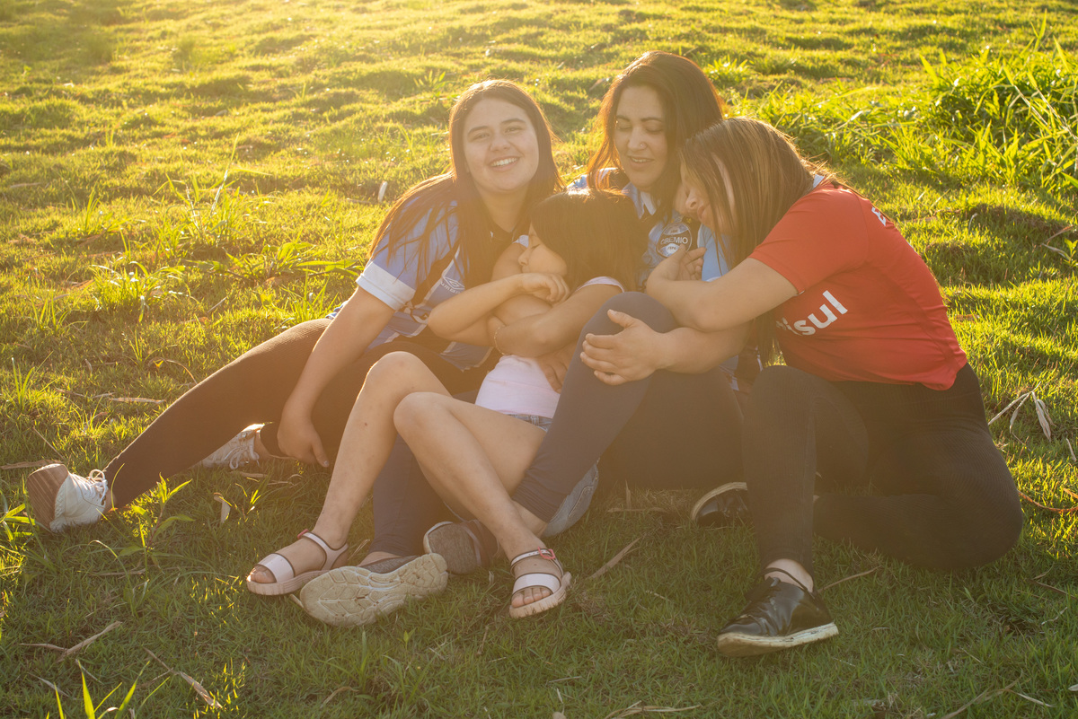 foto espontânea de família, contraluz, gremistas e coloradas